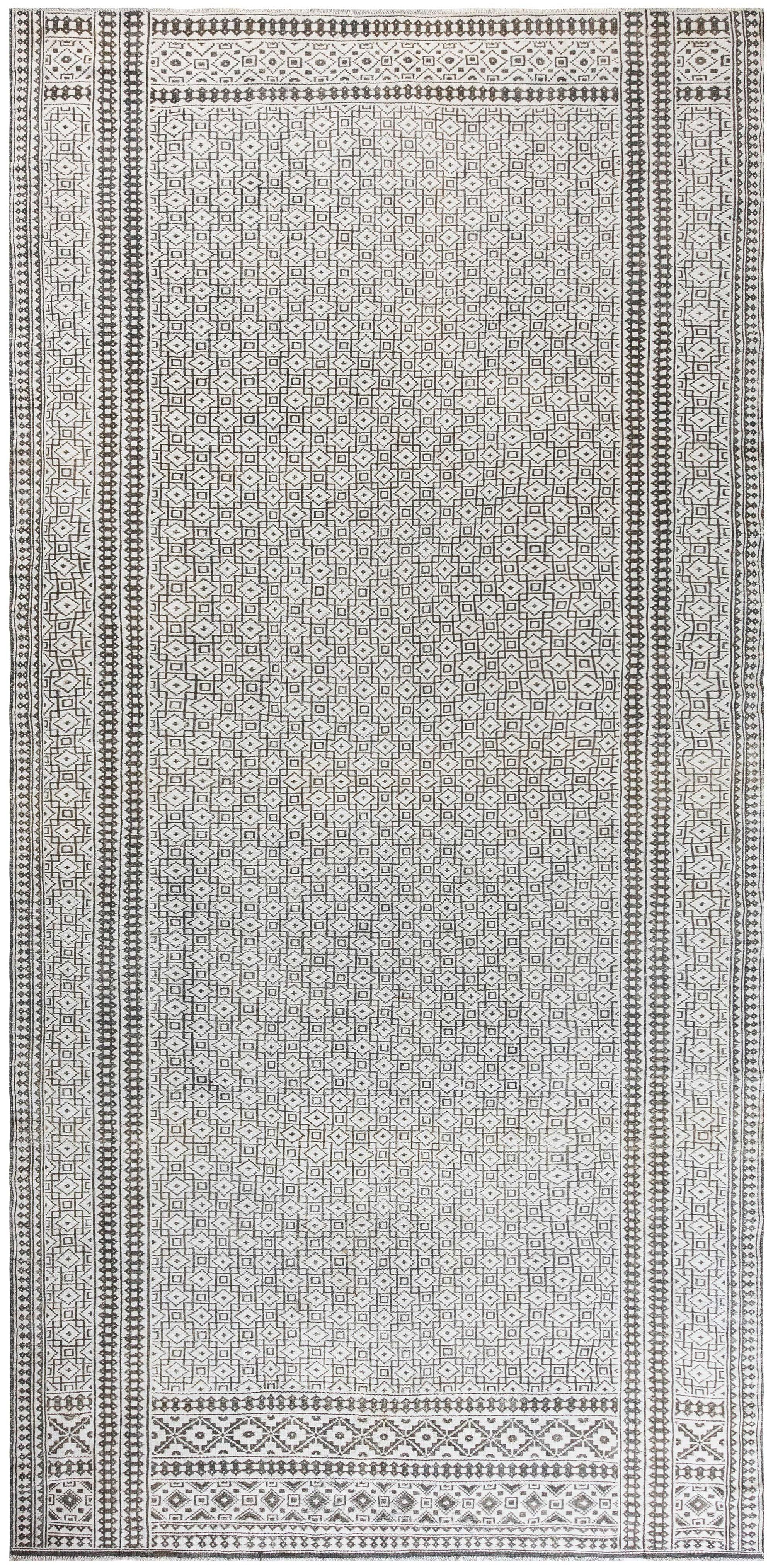 Antique Indian Agra Geometric Grey and White Handmade Rug.
Size: 8'8