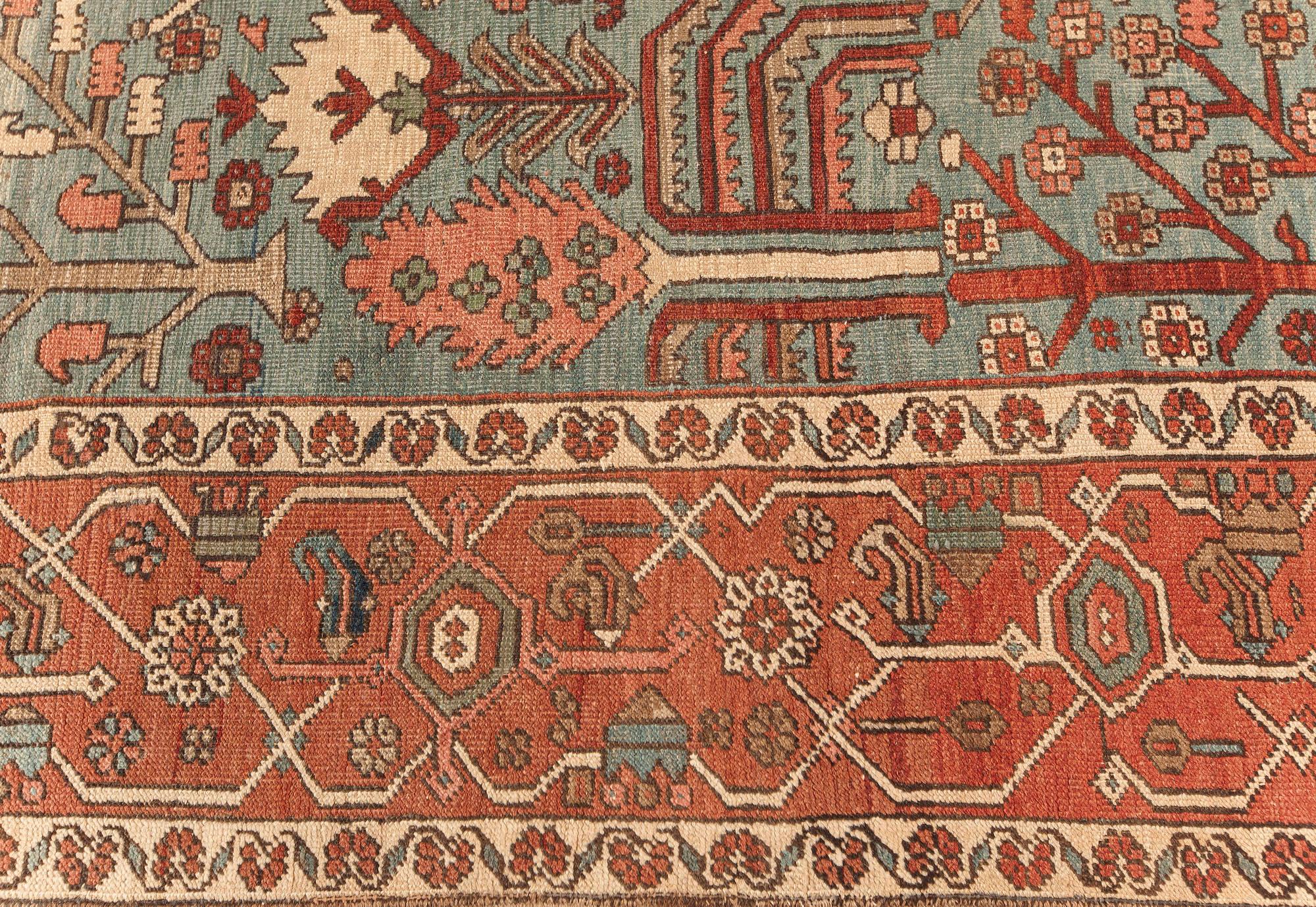 One-of-a-kind Antique Persian Heriz rug in beige, blue, brown, green and pink
Size: 10'0