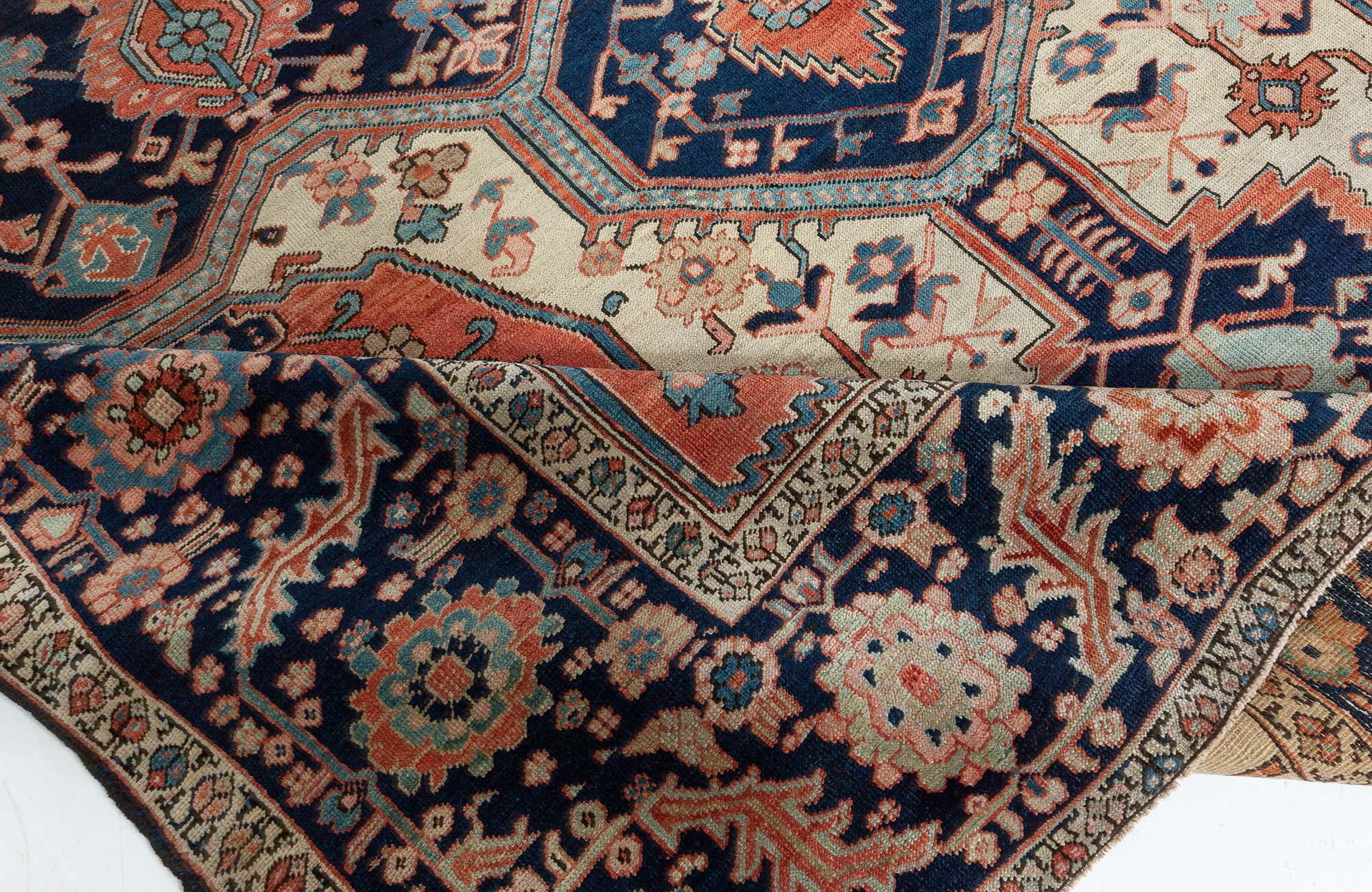 Antique Persian Heriz rug
Size: 9'6