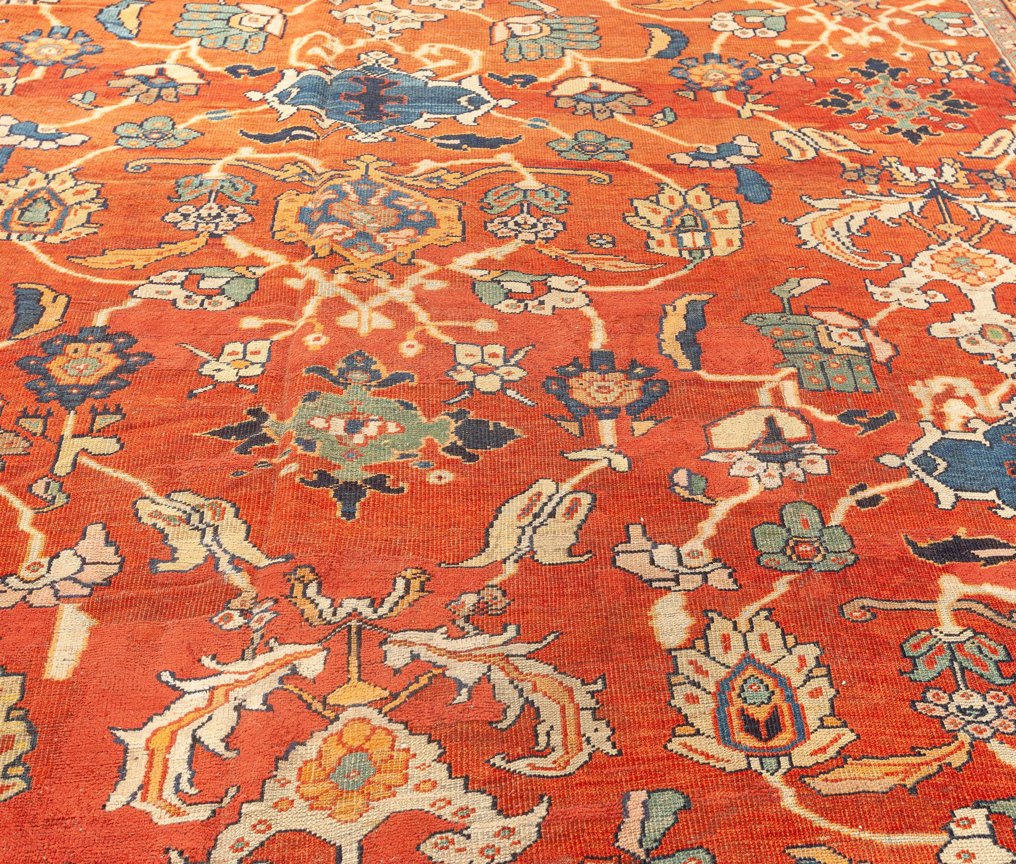 Noué à la main Tapis persan ancien Sultanabad rouge botanique fait à la main Doris Leslie Blau en vente