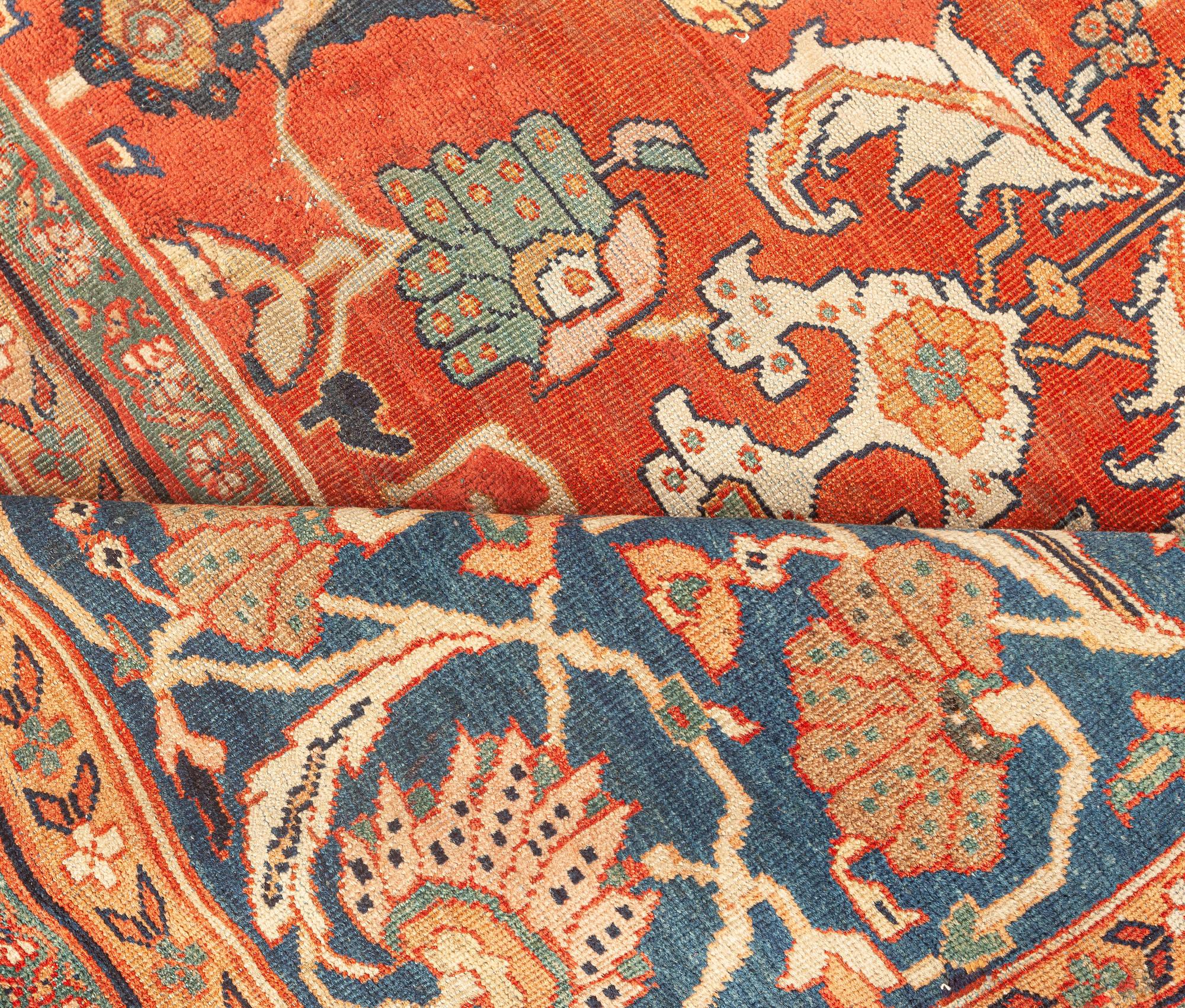 Laine Tapis persan ancien Sultanabad rouge botanique fait à la main Doris Leslie Blau en vente