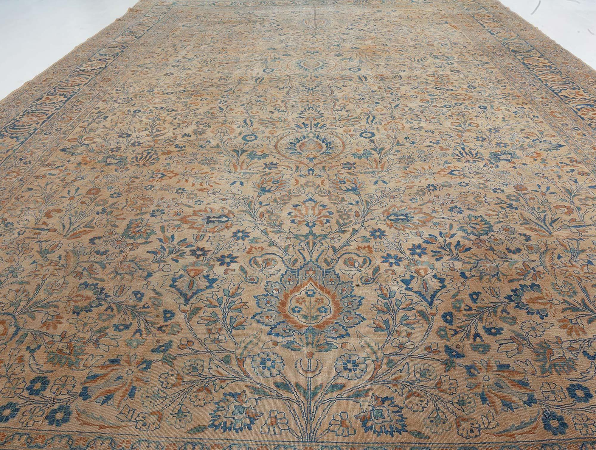 Authentic 1900s Persian Kirman handmade wool rug
Size: 11'9