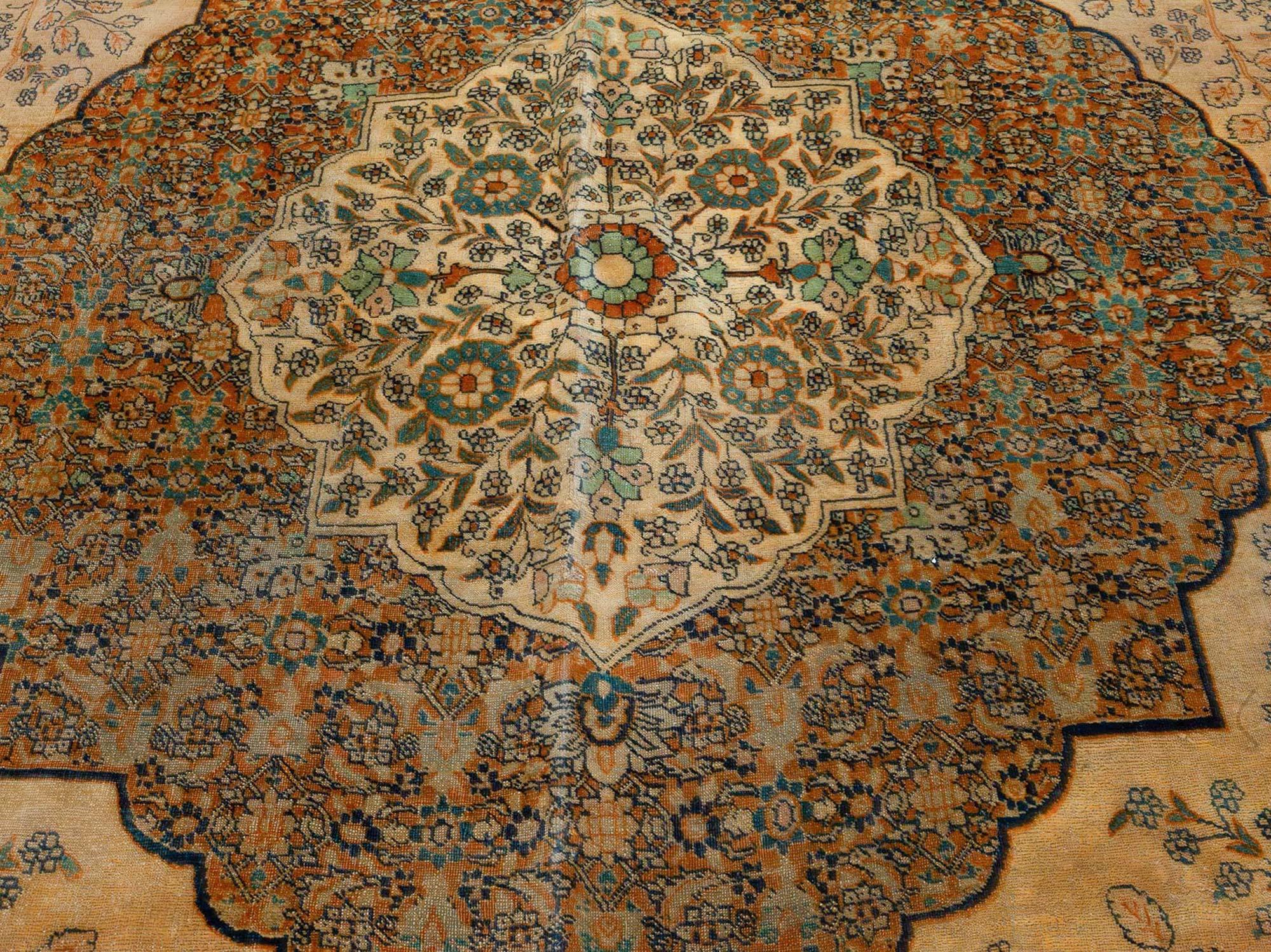 19th century Persian Tabriz green, beige and black hand knotted wool rug
Size: 7'1