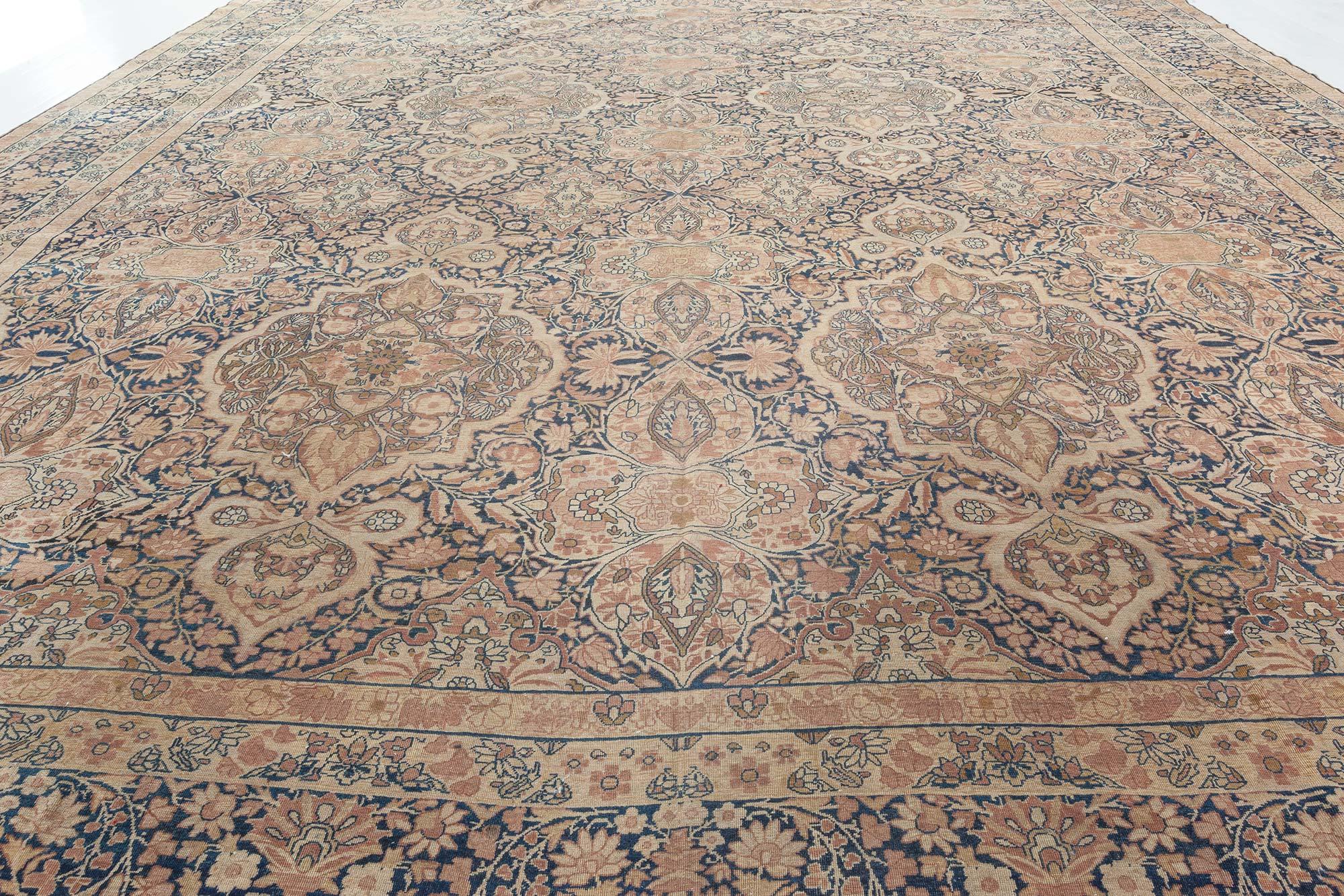 One-of-a-kind Antique Persian kirman brown rug
Size: 13'8