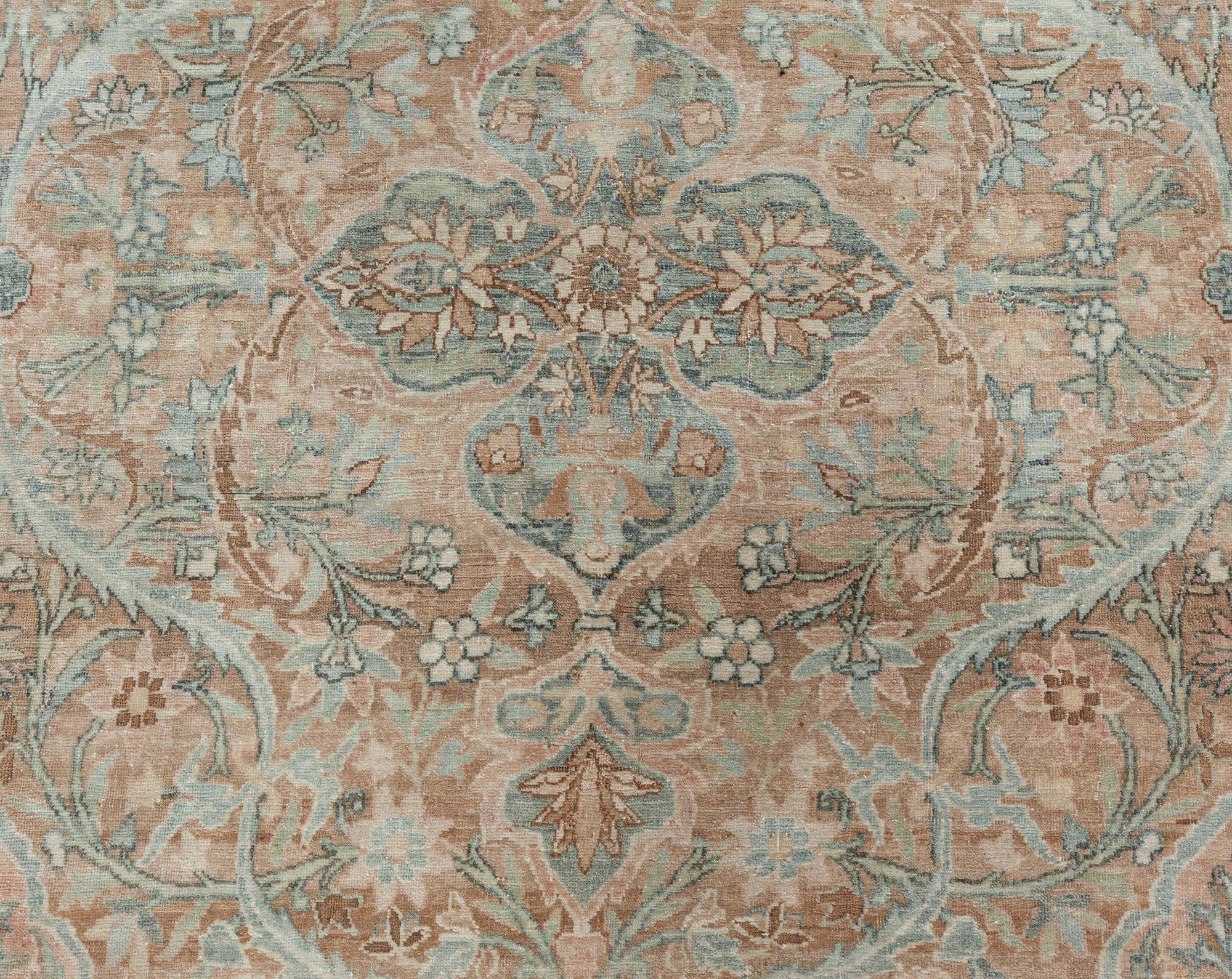 Antique Persian Kirman rug.
Size: 9'0
