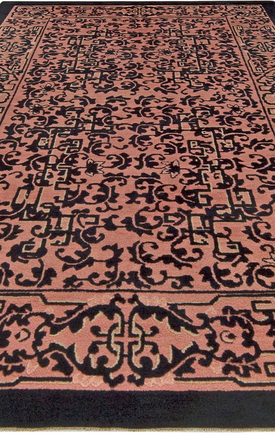 Authentic Early 20th century Chinese black and pale pink wool rug
Size: 5'0