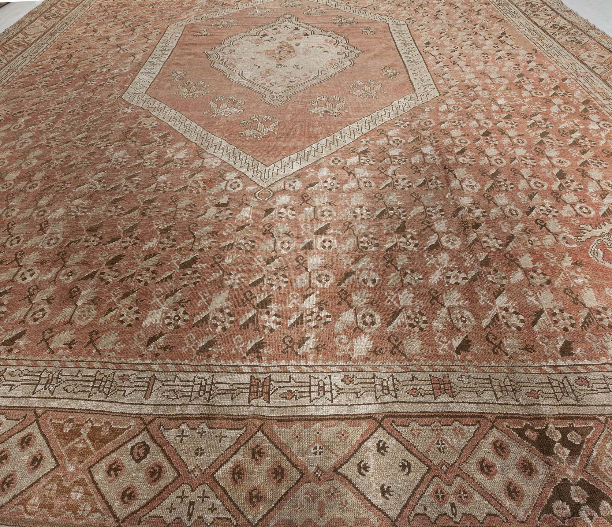 Extra large antique Turkish Ghiordes handmade wool rug
Size: 16'7