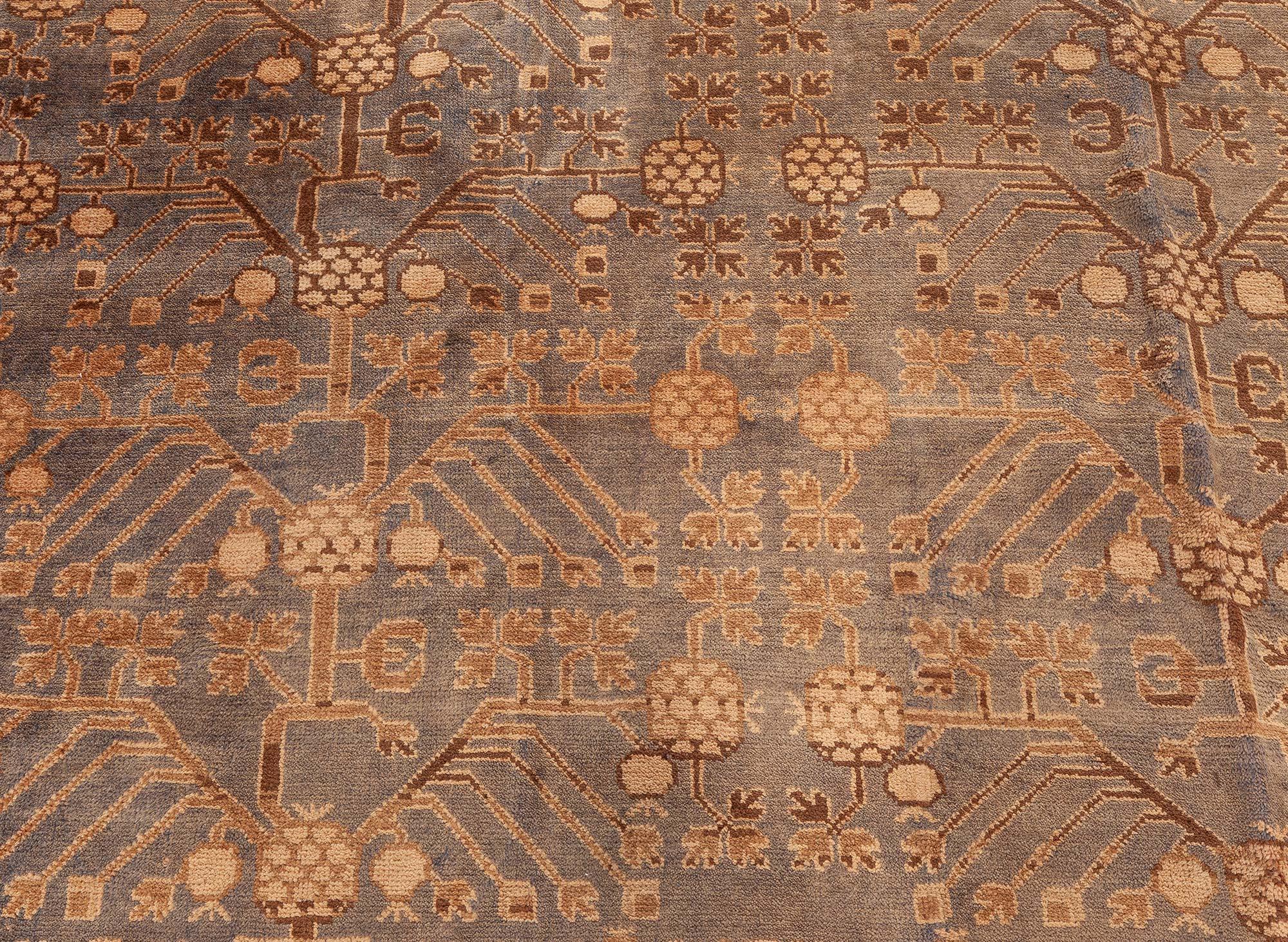 Fine Vintage Samarkand (Khotan) Handmade Wool Carpet
Size: 9'7