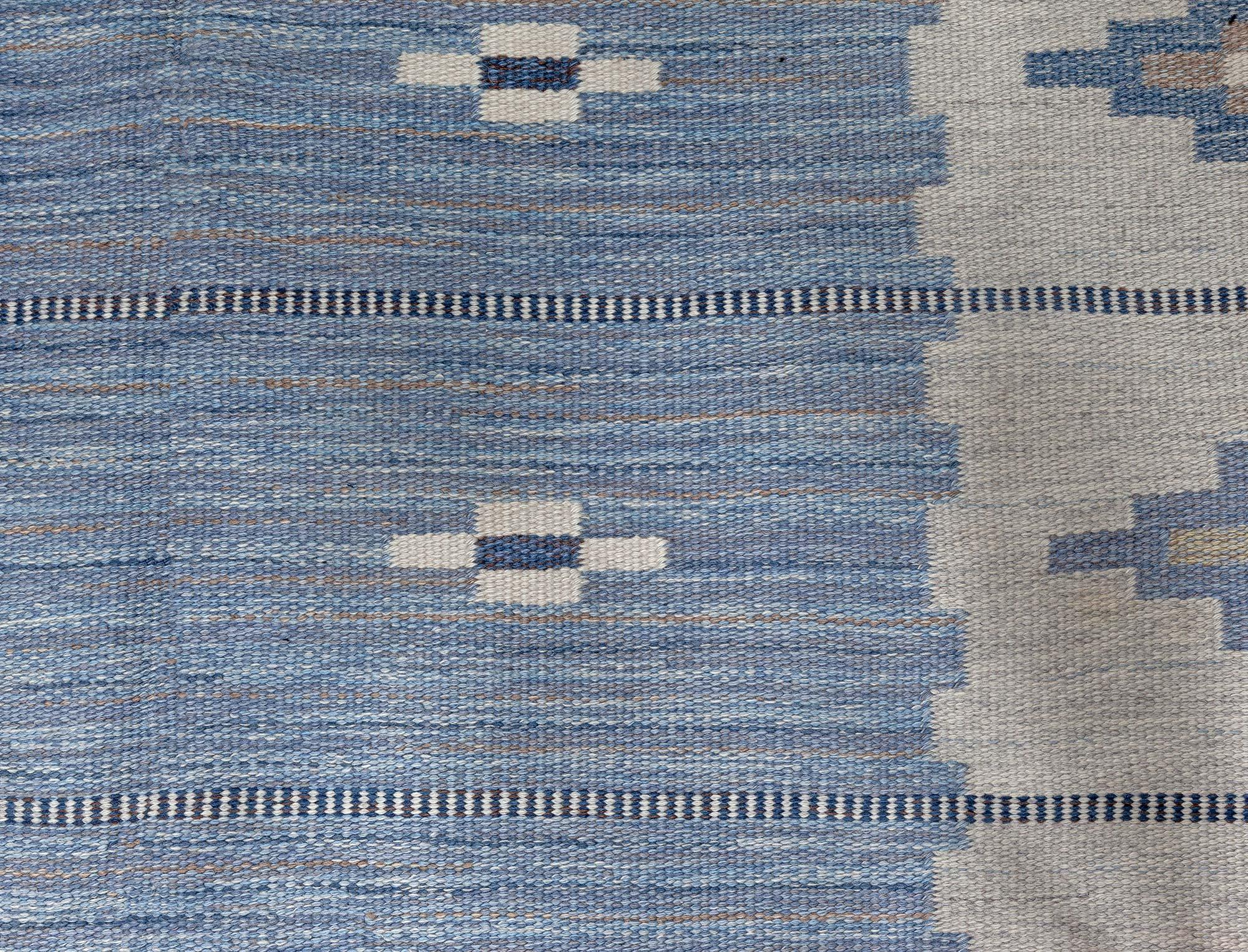 Vintage Swedish blue flat woven rug by Erik Lundberg
Size: 6'5