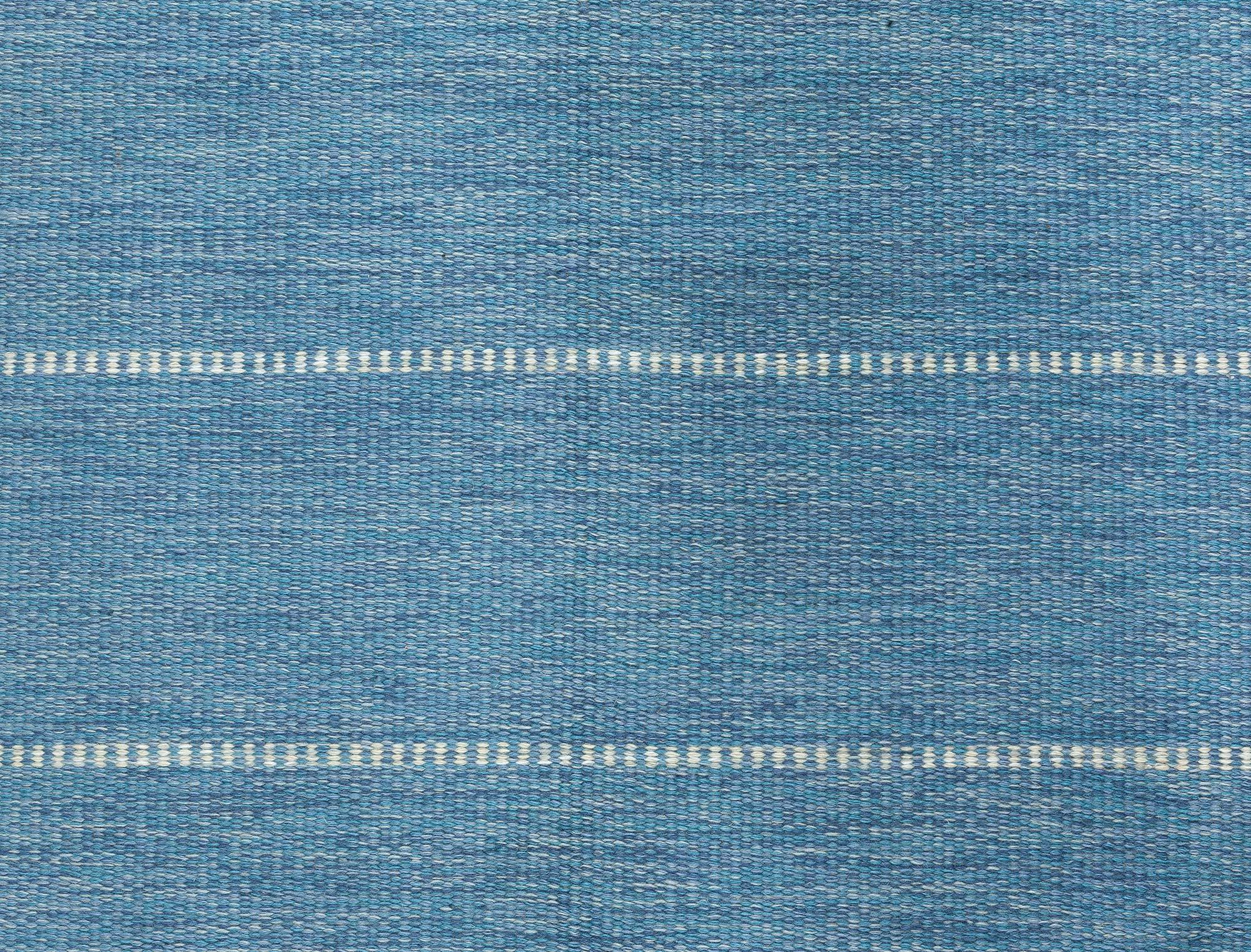 Vintage Swedish Blue Flat Woven rug by Ingegerd Silow
Size: 5'6