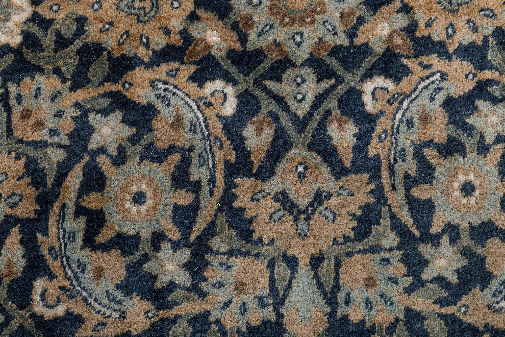 Early 20th century Persian Kirman botanic handwoven wool rug
Size: 9'0