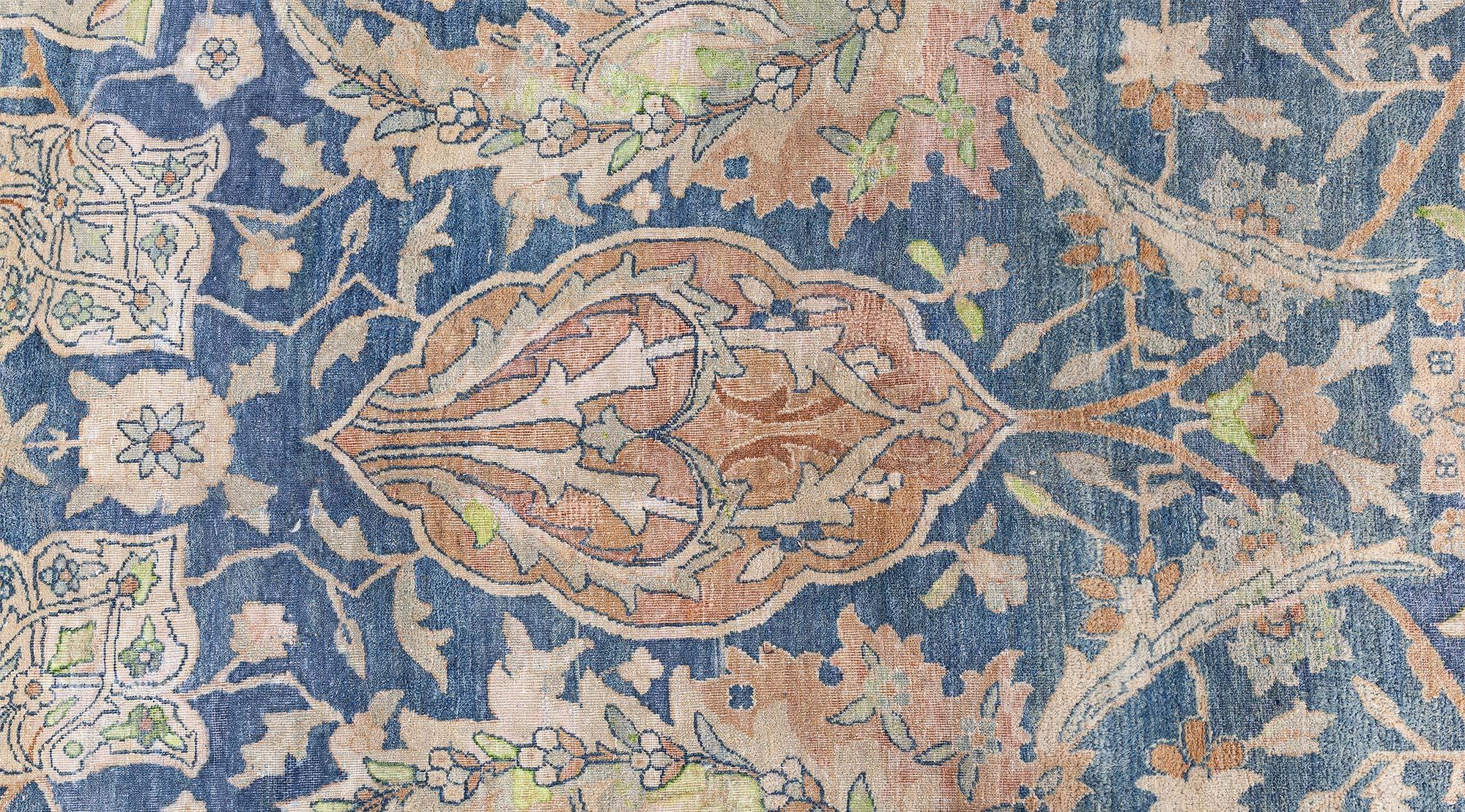 Early 20th century Persian Kirman Indigo, camel, beige, antique washed, handwoven wool rug
Size: 8'9