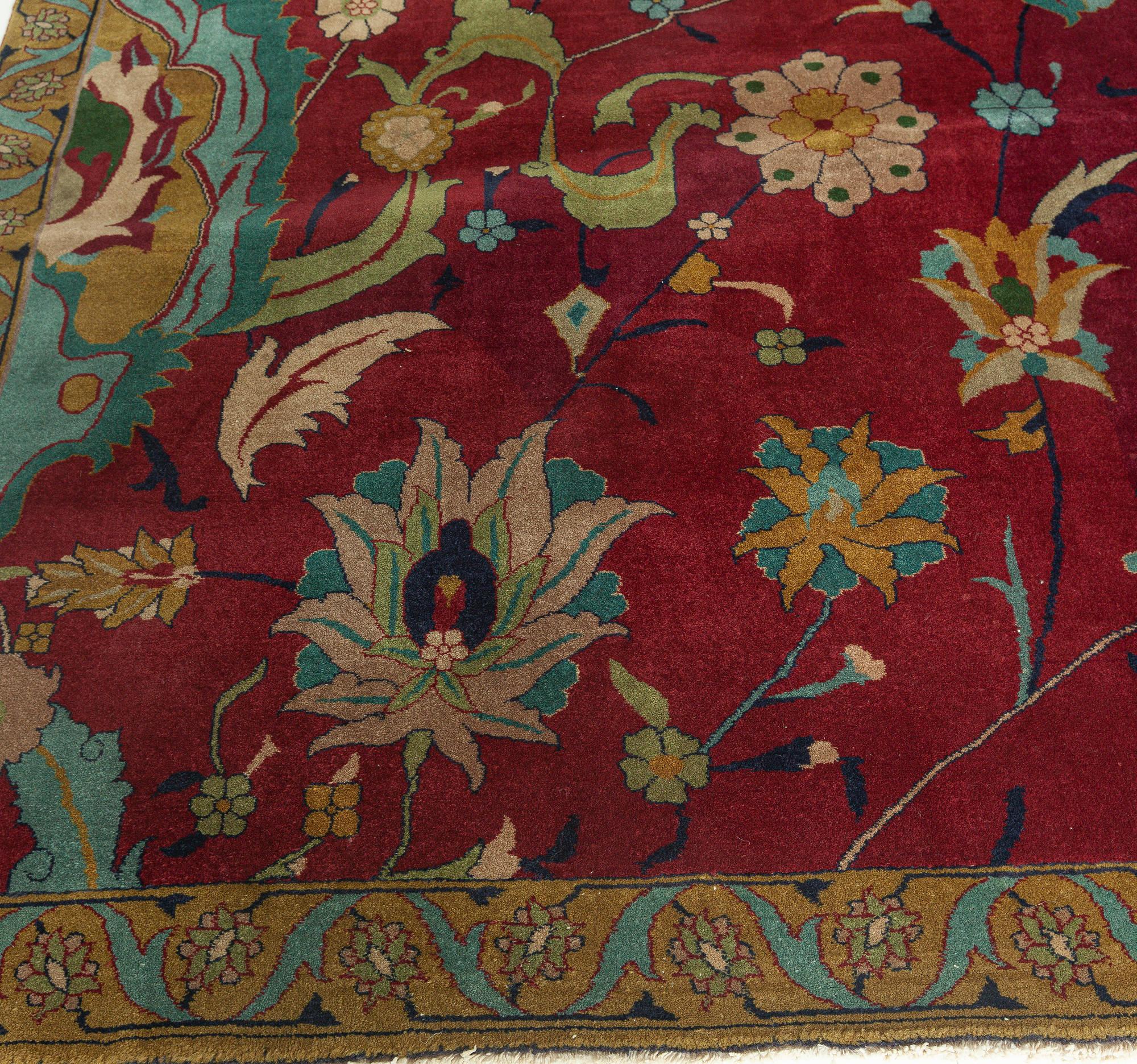 Early 20th century purple background floral Indian handmade wool rug
Size: 13'4