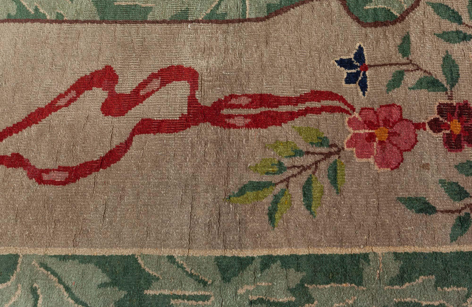Mid-20th century Art Deco Chinese green and red hand knotted wool rug
Size: 6'0