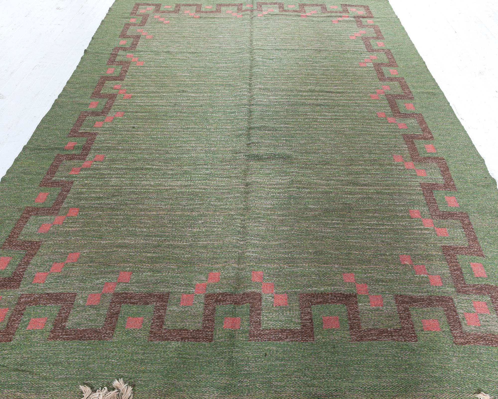 Mid-20th Century Swedish Green, Coral Red handmade wool rug by Ellen Stahlbrand
Size: 7'5