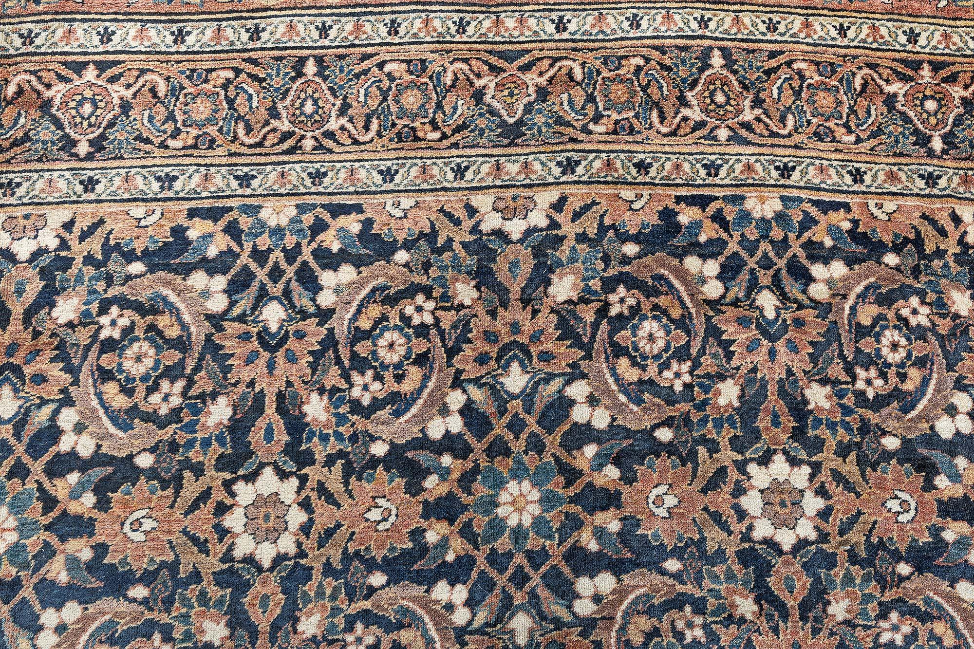 Oversized Antique Persian Meshad Rug
Size: 14'2