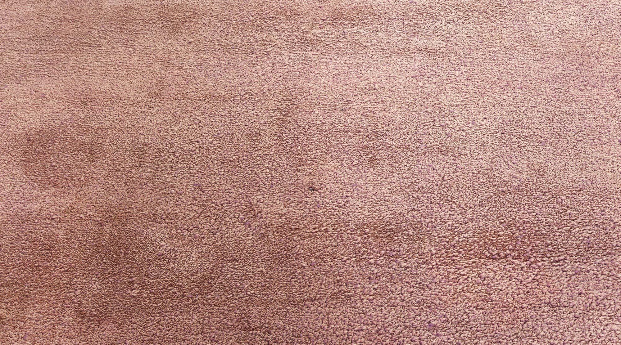 A rare Vintage Arts & Crafts Donegal rug in aubergine and green
Size: 10'4