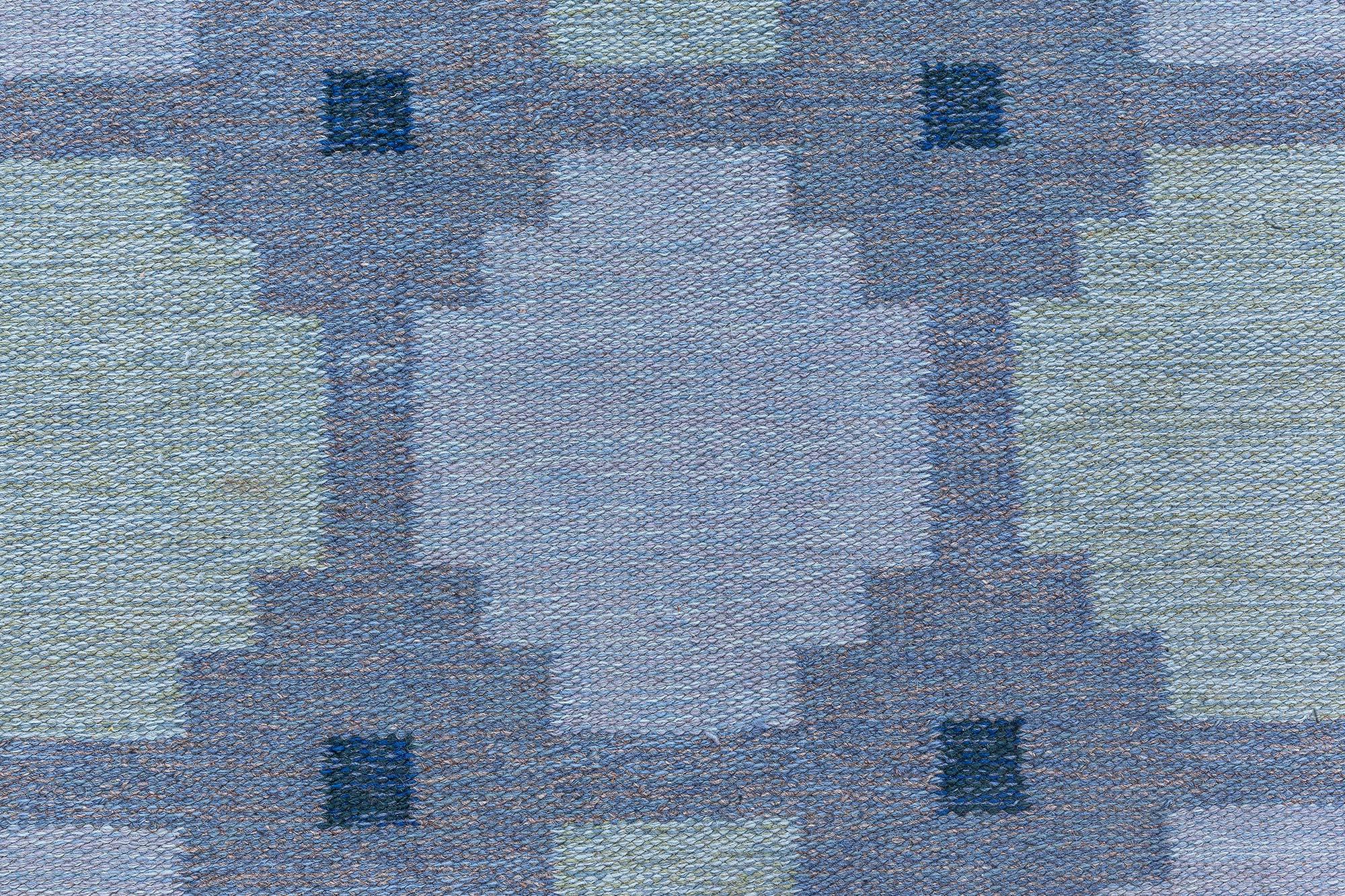 Tapis suédois tissé plat bleu géométrique Doris Leslie Blau
Taille : 5'10