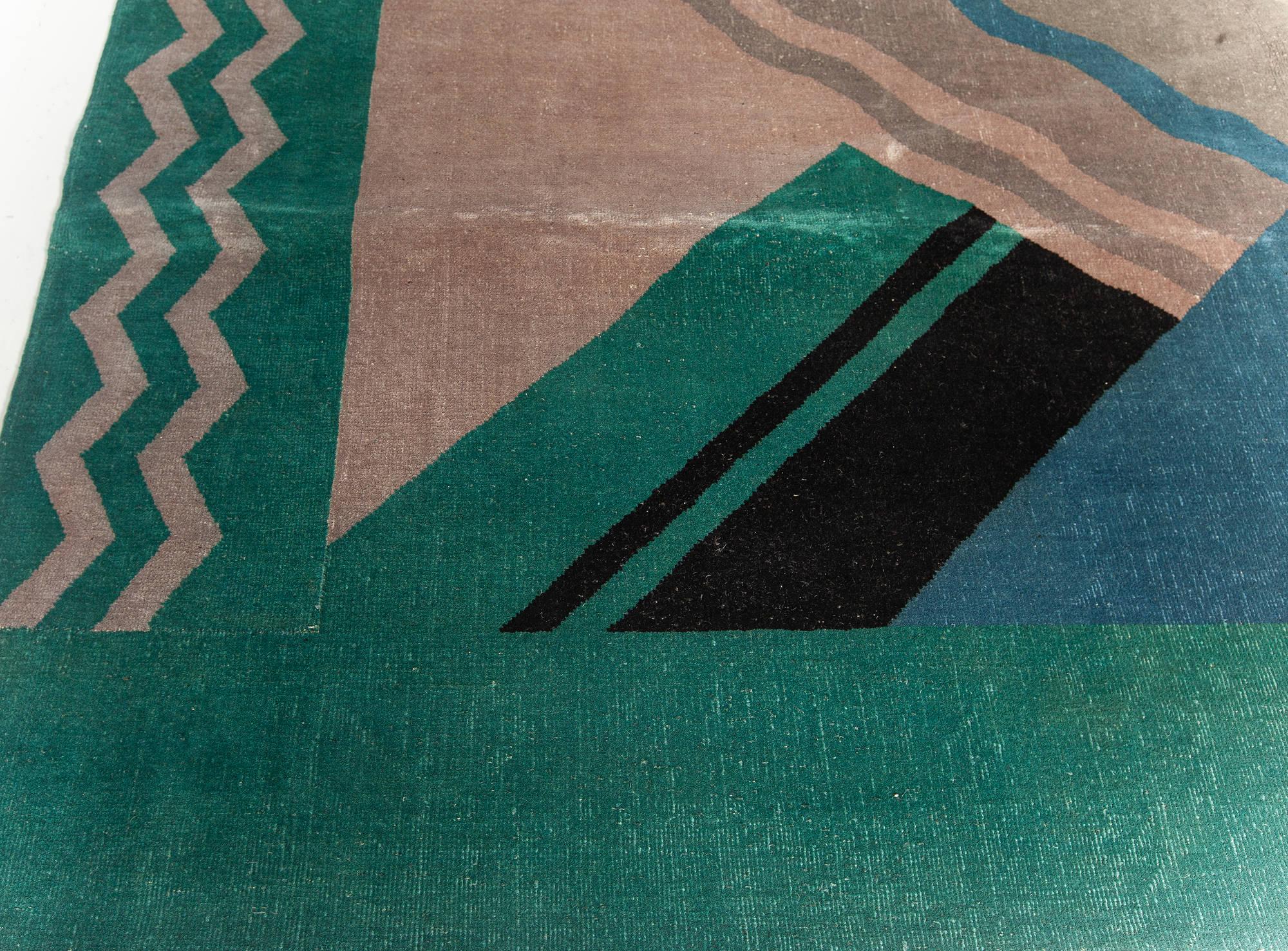 Vintage Chinese Art Deco green, blue and beige handwoven wool rug
Size: 13'7