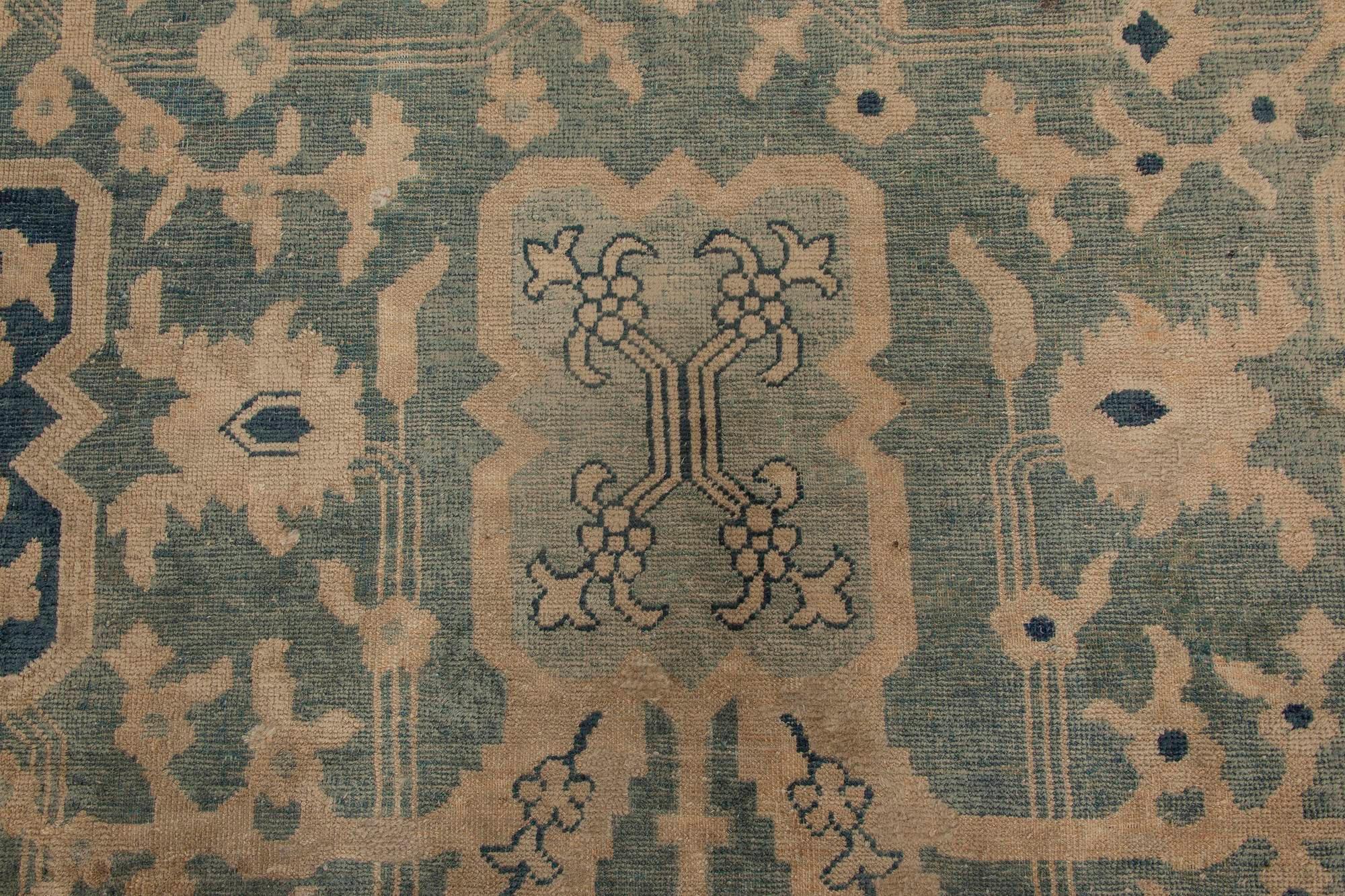 Vintage Chinese blue handwoven wool rug.
Size: 9'7