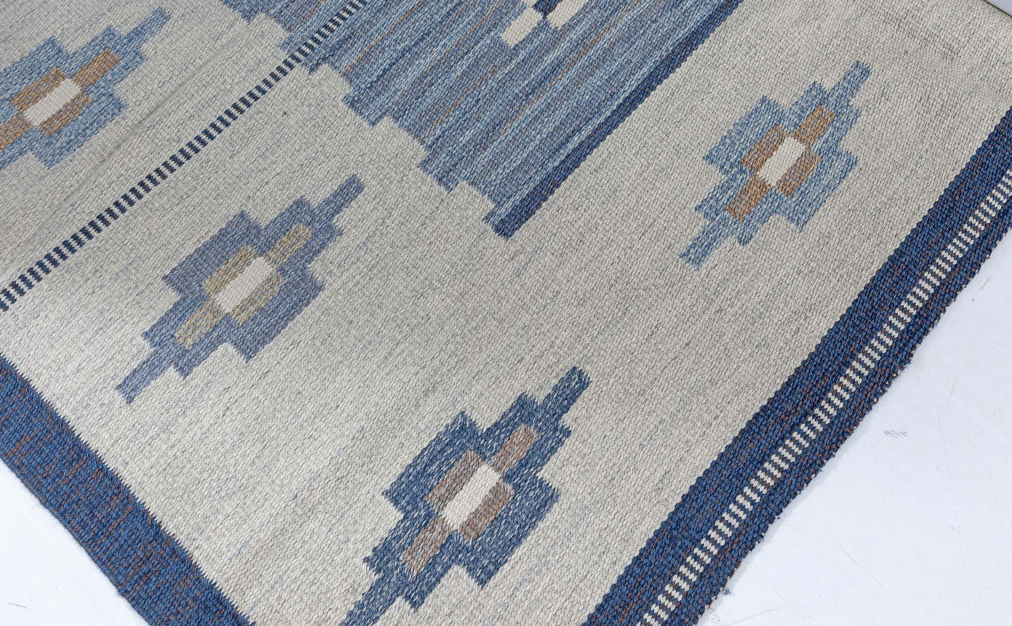 Vintage Swedish blue flat woven rug by Erik Lundberg
Size: 6'5