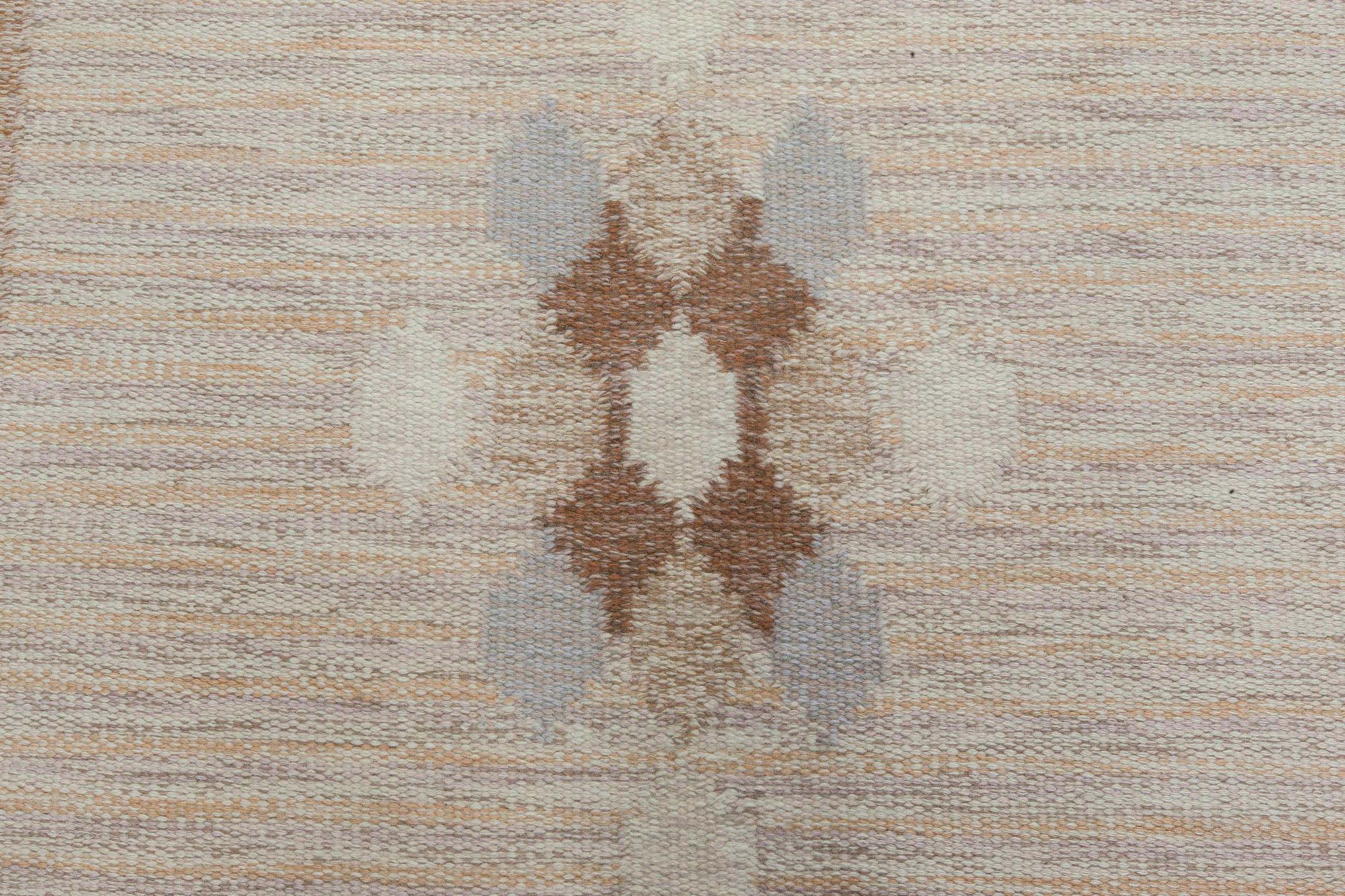 Vintage Swedish caramel rug by Ingegerd Silow. Woven signature to edge 'IS'
Size: 4'4