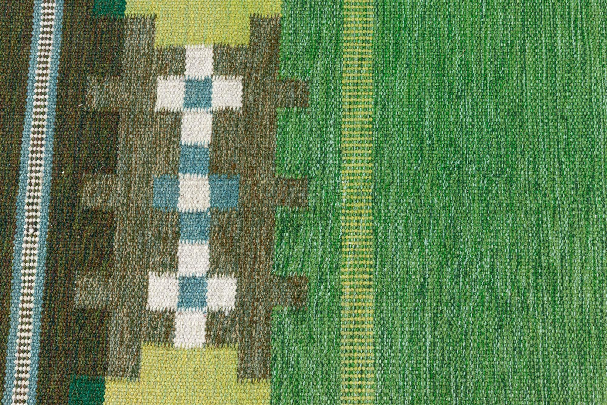 Tappeto svedese vintage a trama piatta con motivi geometrici e verde intenso
Dimensioni: 6'8