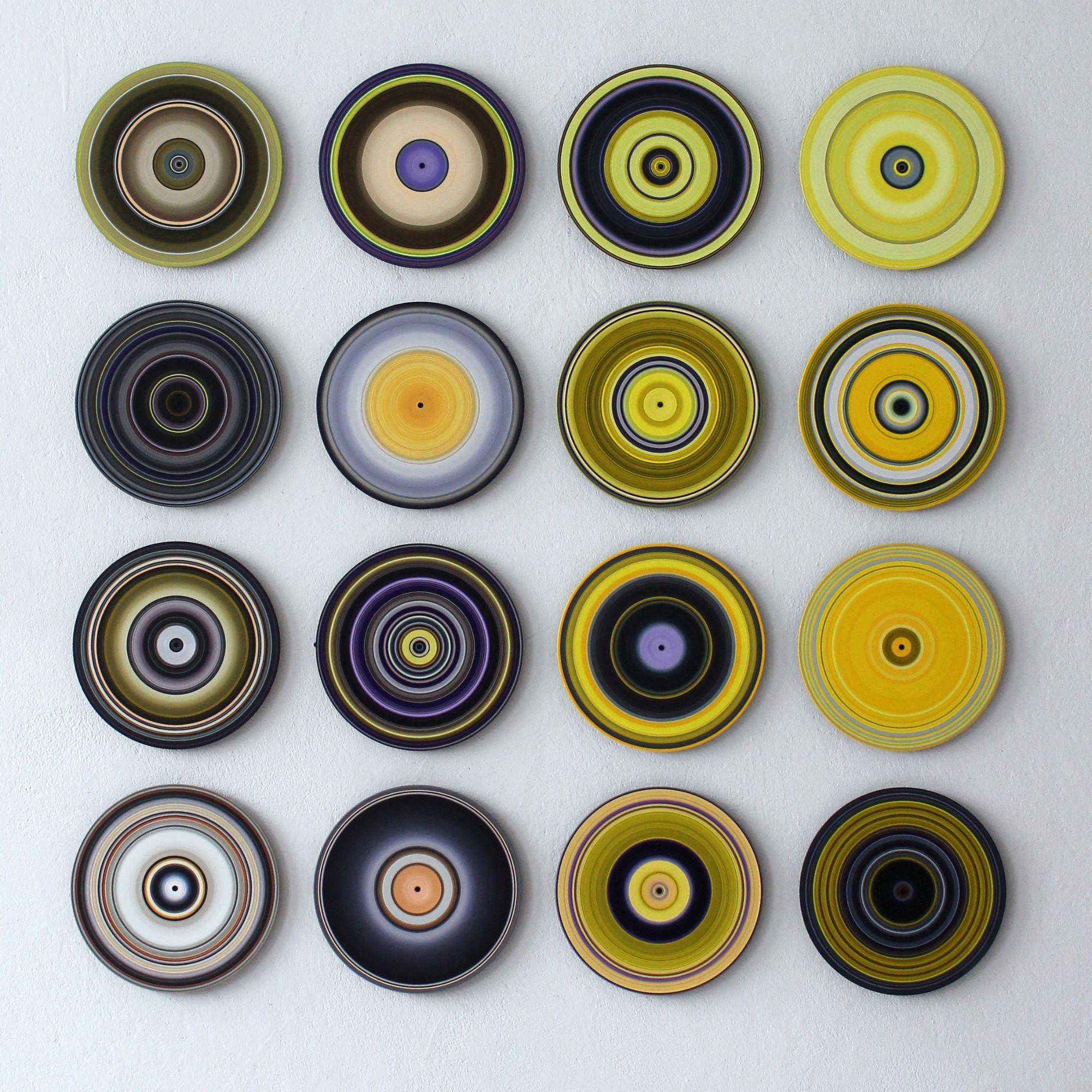 SOUND AND VISION – You called me mellow yellow is a unique oil on vinyl installation by German contemporary artist Doris Marten, dimensions are 135 × 135 cm (53.1 × 53.1 in). Every piece is 30 cm in diameter (11.8 in).
The artwork is signed, sold