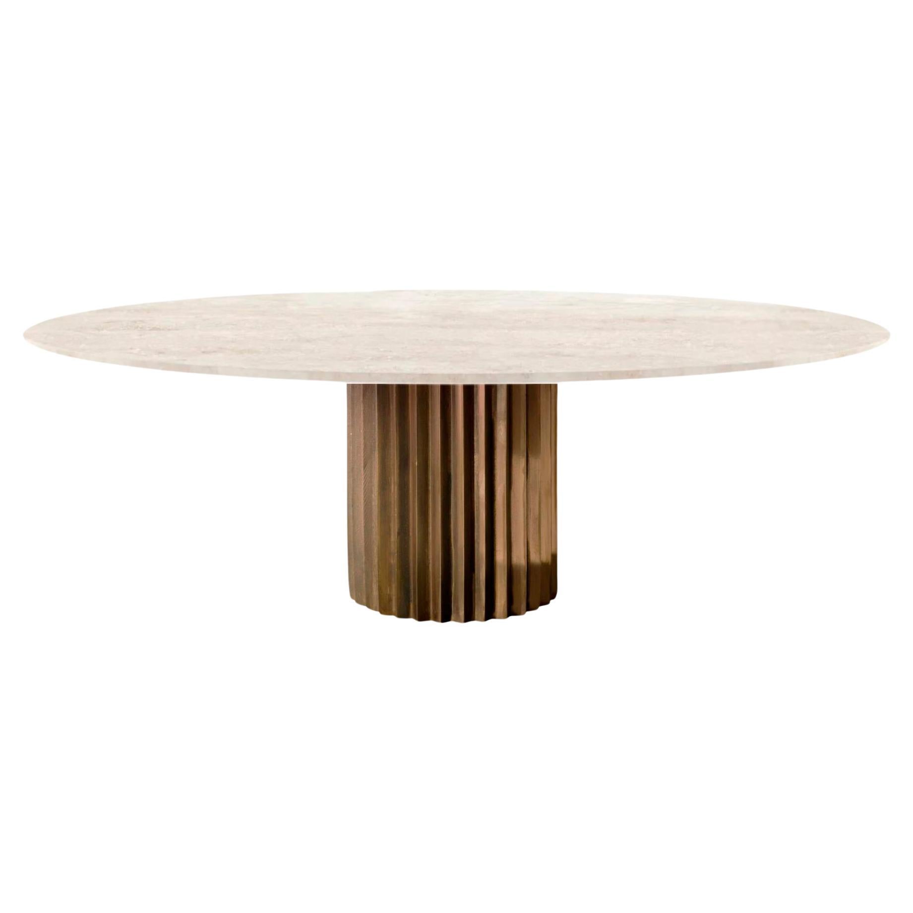 Doris Oval Pedestal Dining Table in Travertine and Cast Bronze by Fred&Juul