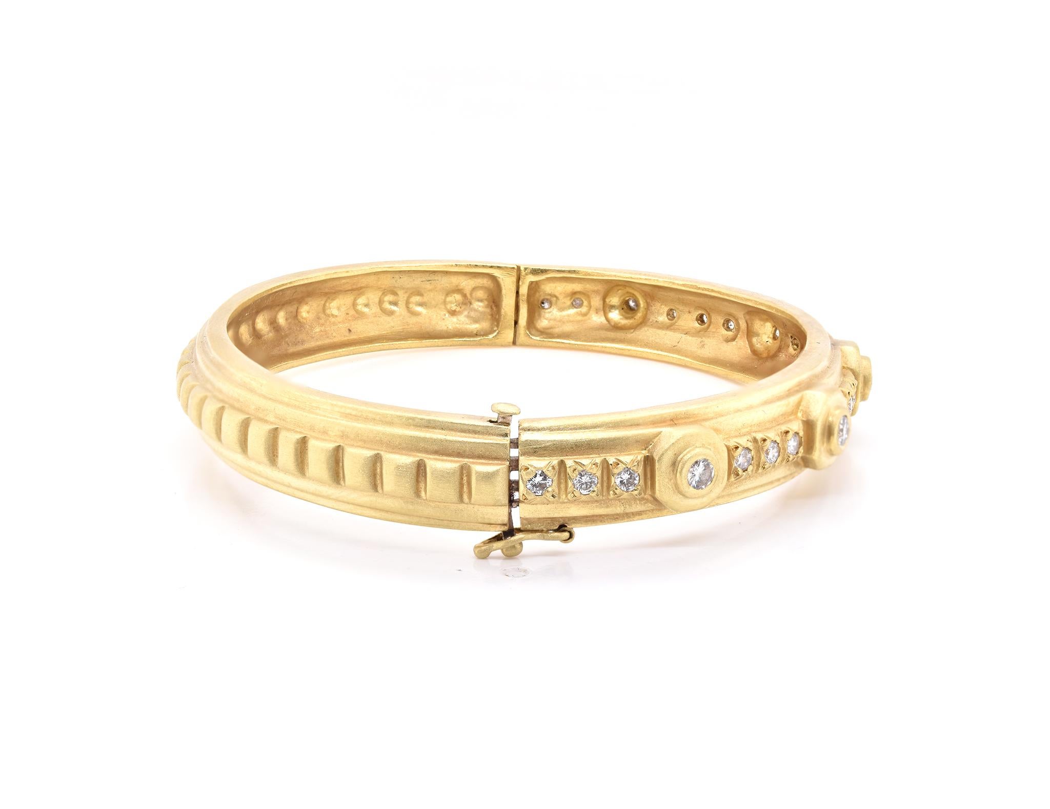 Designer: Doris Panos
Material: 18K yellow gold
Diamonds: 22 round brilliant cut = .64cttw
Color: G
Clarity: VS2
Weight: 39.93 grams
Measurement: bracelet will fit up to a 7-inch wrist
