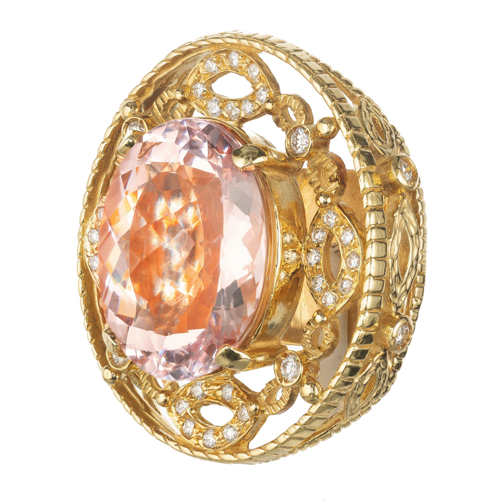 Doris Panos pink morganite and diamond pendant slide. 18k Yellow Gold open work setting with an oval morganite center stone with round accent diamonds in an open work pendant. The back hinges open to fit a flat or round chain or necklace. The