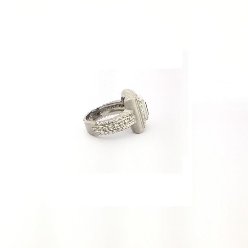 Doris Panos Tanzanite and Diamond Ring in 18k White Gold 
Diamonds 0.65 carat total weight 
Ring Size 6
R812TAN
