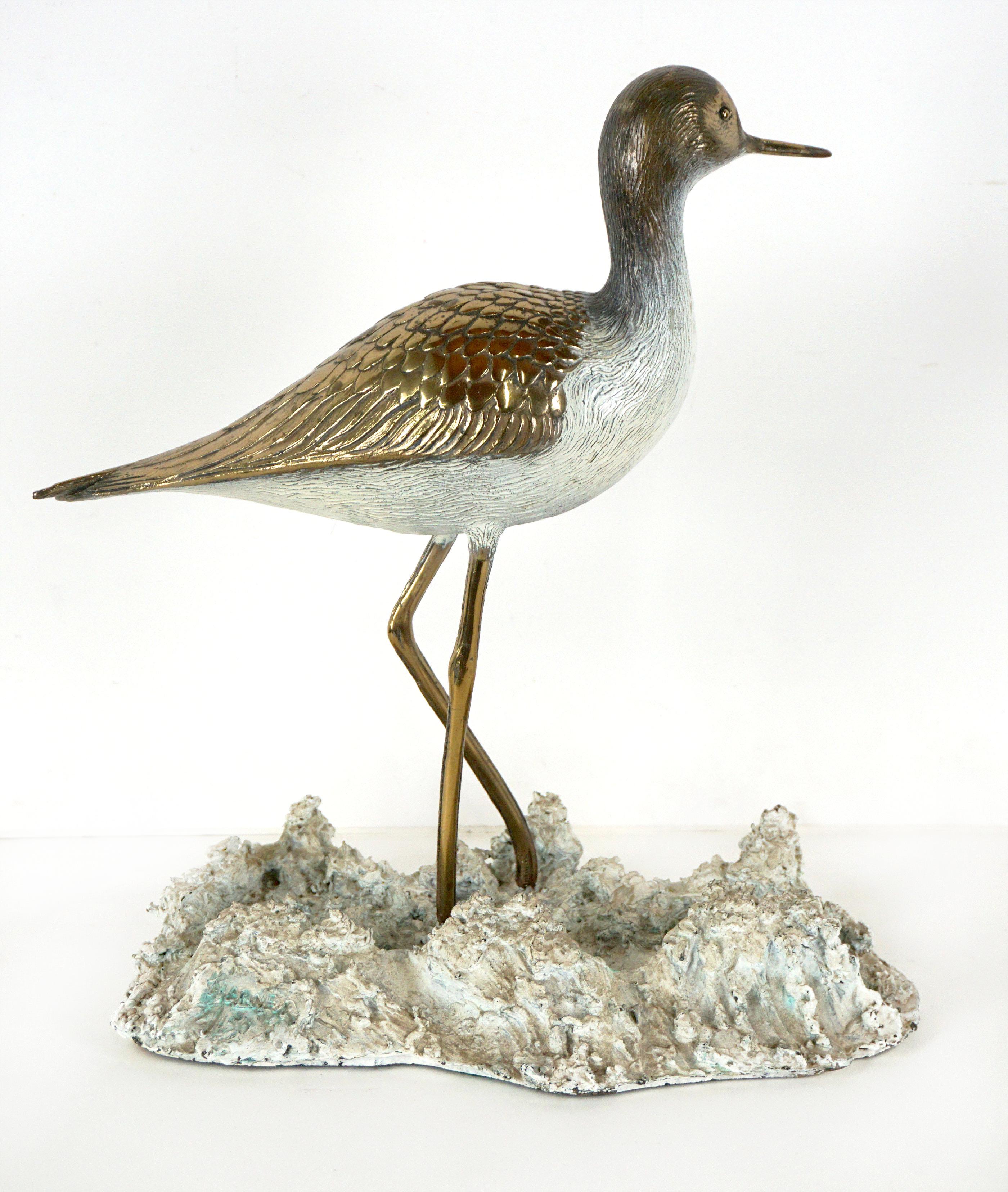 Modern Bronze and Ceramic Sculpture of Silt Sandpiper in Waves.

Beautiful bronze sculpture of iconic Californian Silt Sandpiper in the waves by Doris Ann Warner (American, 1925-2010), circa 1970. This piece is beautifully executed bronze bird on