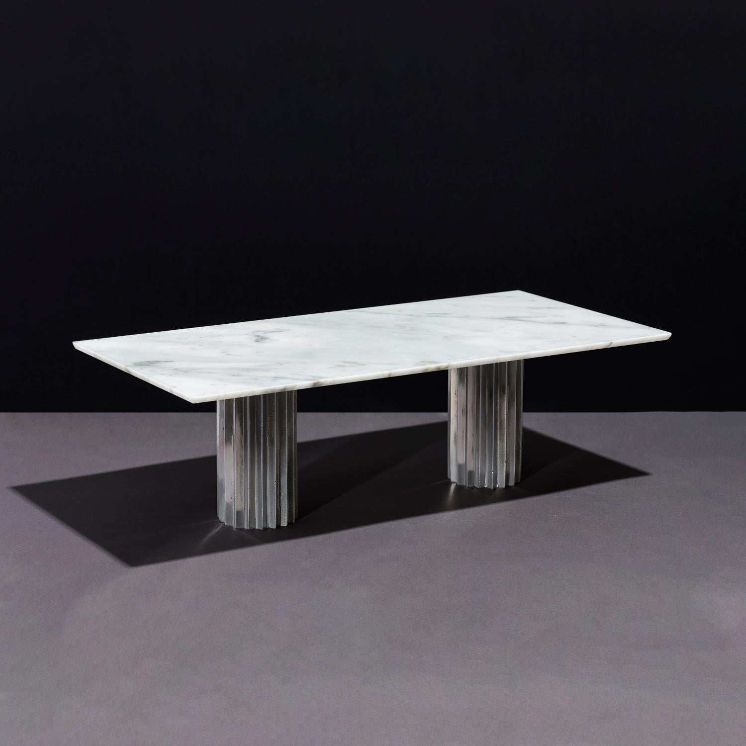 Doris White Carrara Marble Rectangular Dining Table by Fred and Juul
Dimensions: D 120 x W 240 x H 74 cm.
Materials: Aluminum and white Carrara marble.

Available in round, oval and rectangular shapes. Also available in different materials. Custom