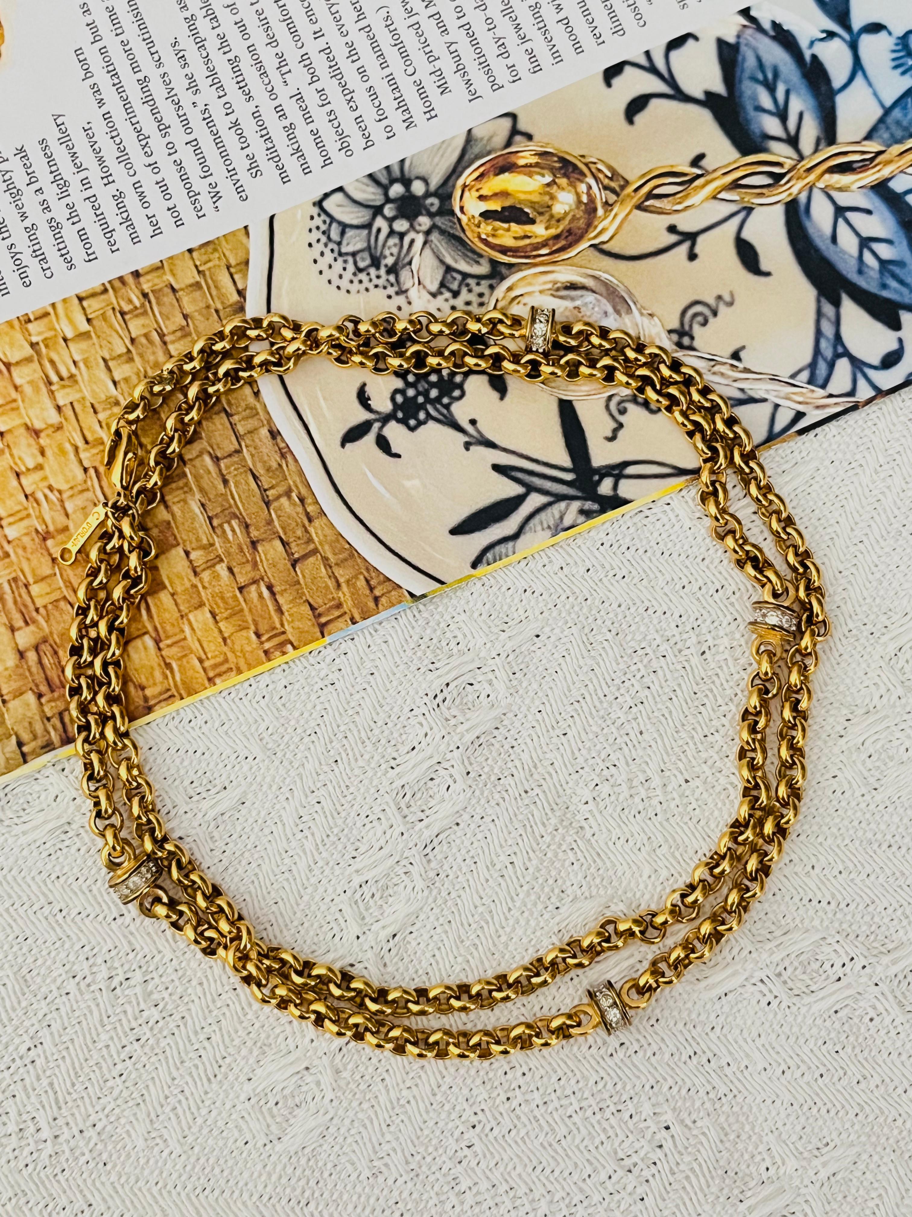 D'Orlan Vintage 1980s Unisex Long 4 Crystals Charms Interlocked Linked Chain Modernist Layers Strands Necklace Bracelet, Gold Tone 

Very good condition. Light scratches or colour loss, barely noticeable. 100% Genuine. 

Can be worn as a bracelet,