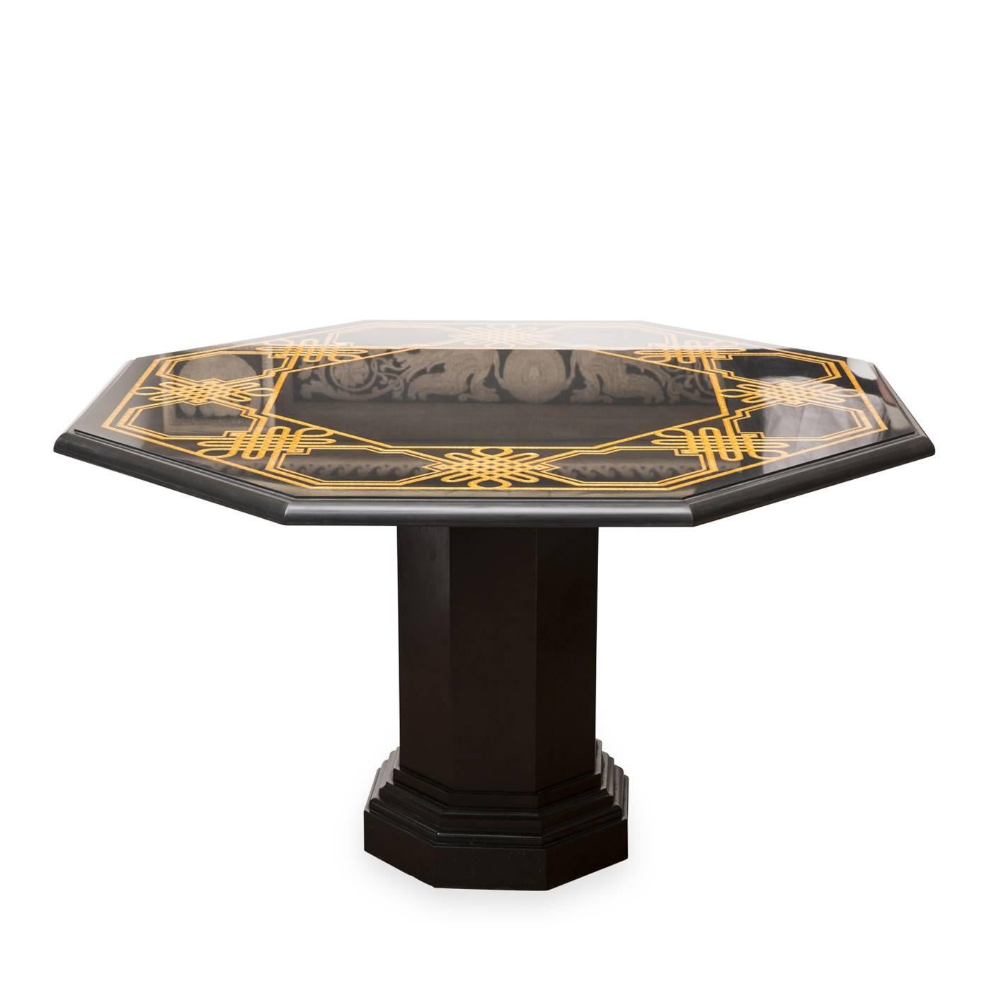 This octagonal table top is an original black slate piece flawlessly engraved and gilded as result of expert work by marble workshop Bianco Bianchi. The gold leaf inlay gives it a lavish allure, yet this is also a fully functional piece to be used