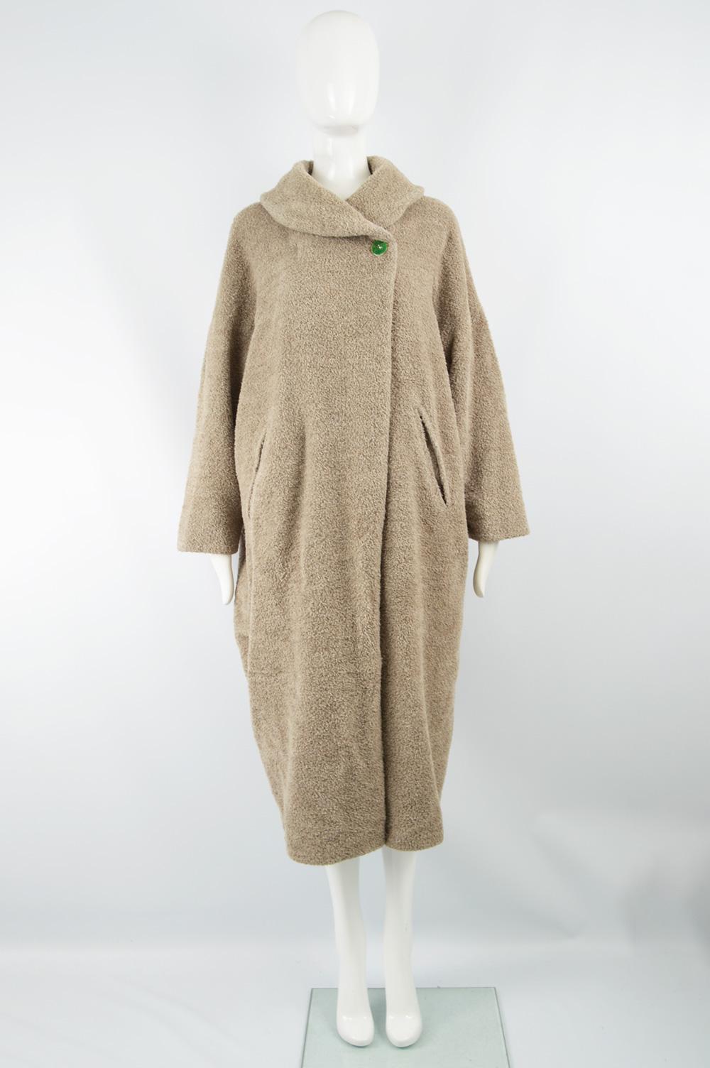 Size:  Marked US S but this gives an oversized, cocoon fit as pictured.
Bust - 52” / 132cm
Waist - 50” / 127cm
Hips - 52” / 132cm
Length (Shoulder to Hem) - 45“ / 114cm
Sleeve Pit to Cuff - 16” / 40cm
Note: Item is displayed on a UK 12/ US 8