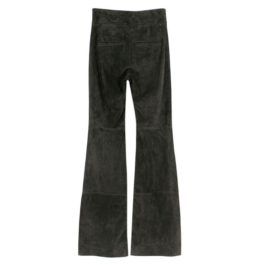 Dorothee Schumacher Aesthetic Attempt Suede Flared Trousers 

- Side Invisible Zip Fastening 
- Flared Bottom 
- Tone Stitching 

100% Leather 
Lining 
68% Acetate 
32% Polyester 

Hand Clean 

Measurements are taken laying flat, seam to seam.