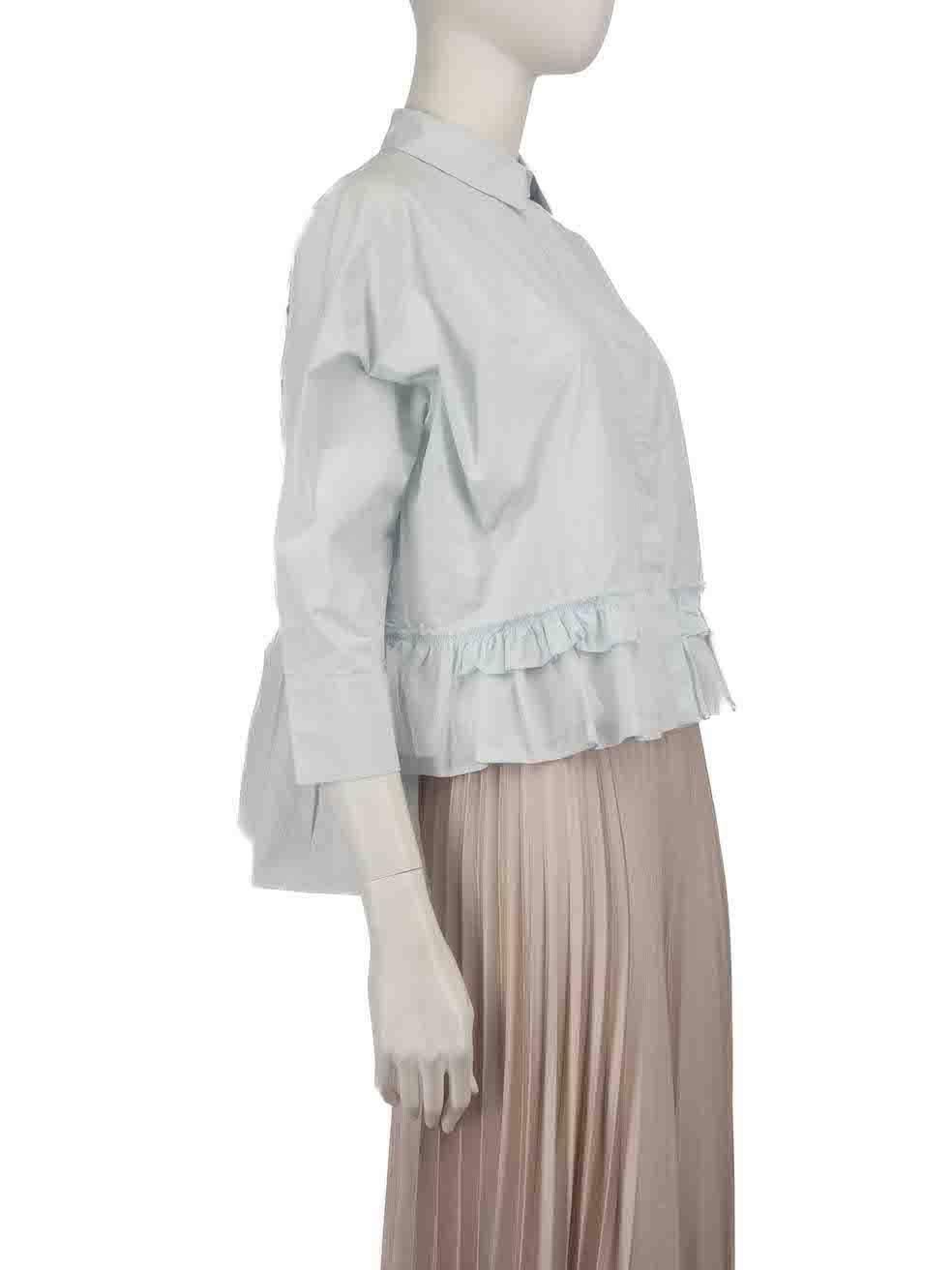 CONDITION is Good. Minor wear to the top is evident. Light wear to the fabric surface with light discolouration seen under the arms. A number of stray thread ends can also be found above the ruffle detailing on this used Dorothee Schumacher designer