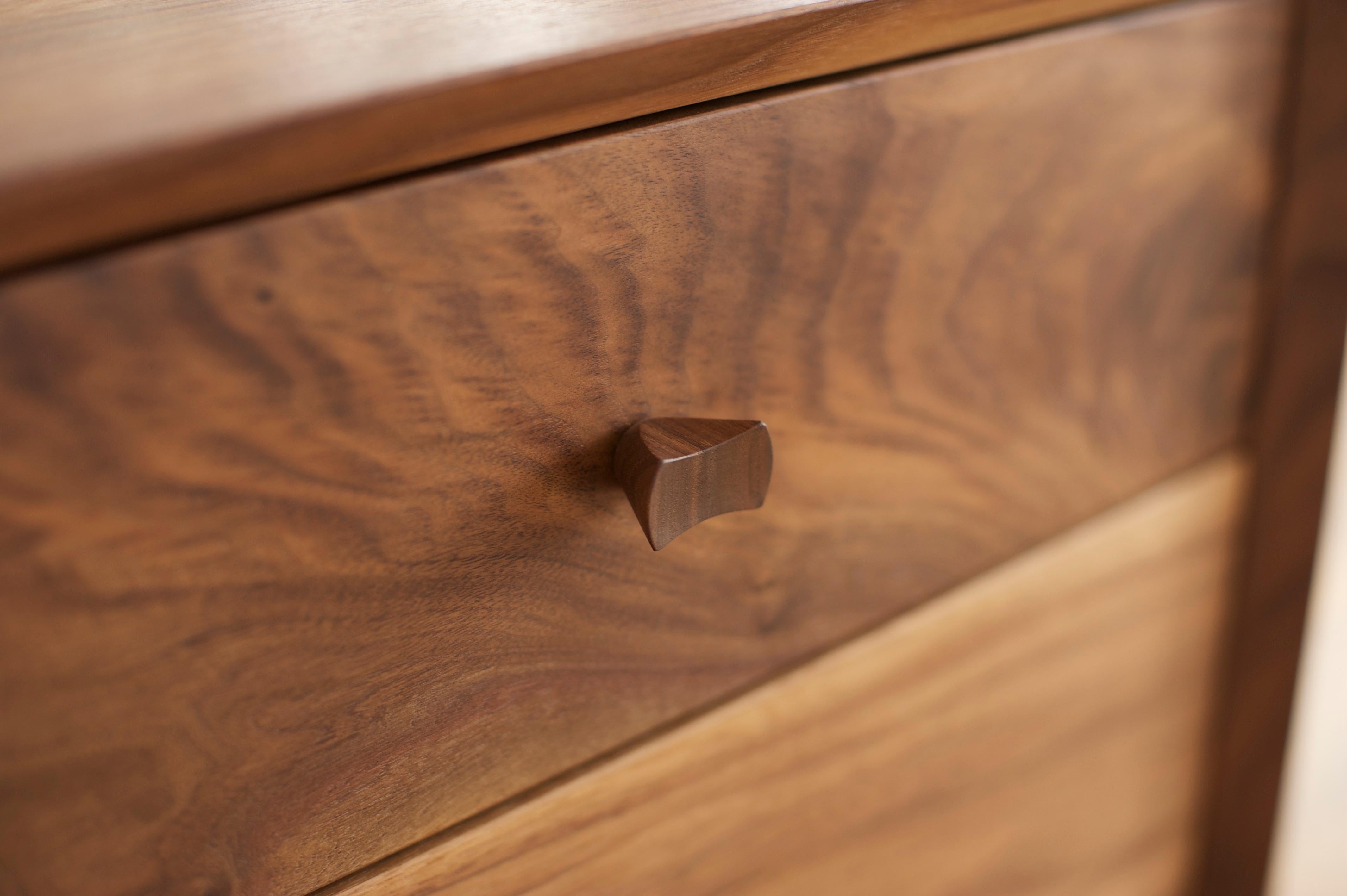 Hardwood Dorothy Bureau, Modern Walnut Chest of Drawers with Turned Legs and Shaped Pulls For Sale