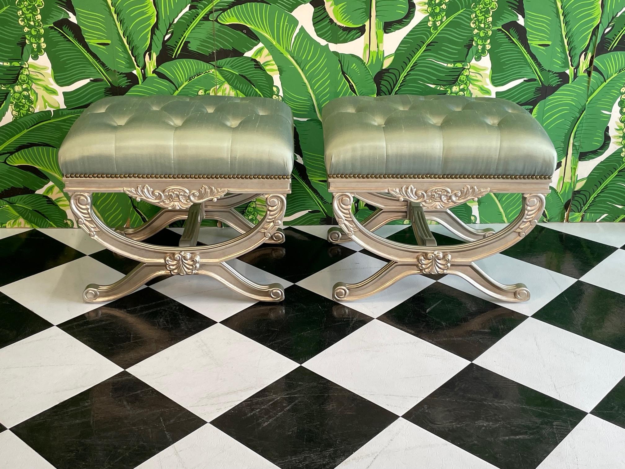 Pair of Hollywood Regency footstools in the style of Dorothy Draper feature a solid wood frame and tufted upholstery. Good condition with minor imperfections consistent with age, see photos for condition details.
For a shipping quote to your exact