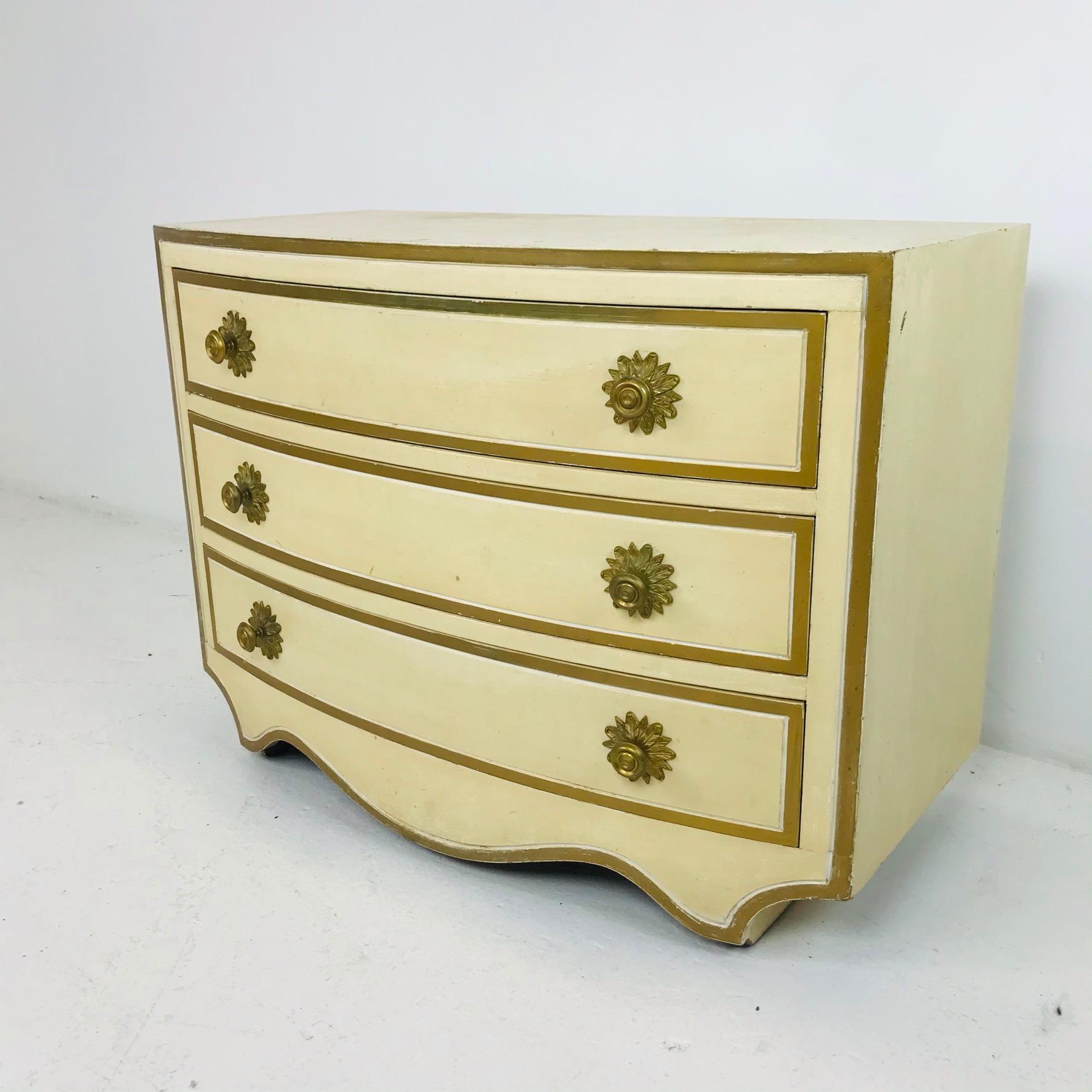 Designed by Dorothy Draper and manufactured by Henredon. This iconic chest is known for its glamorous, Hollywood Regency style. It is part of the Viennese Collection, which debuted around 1963, a couple of years before the release of her Espana