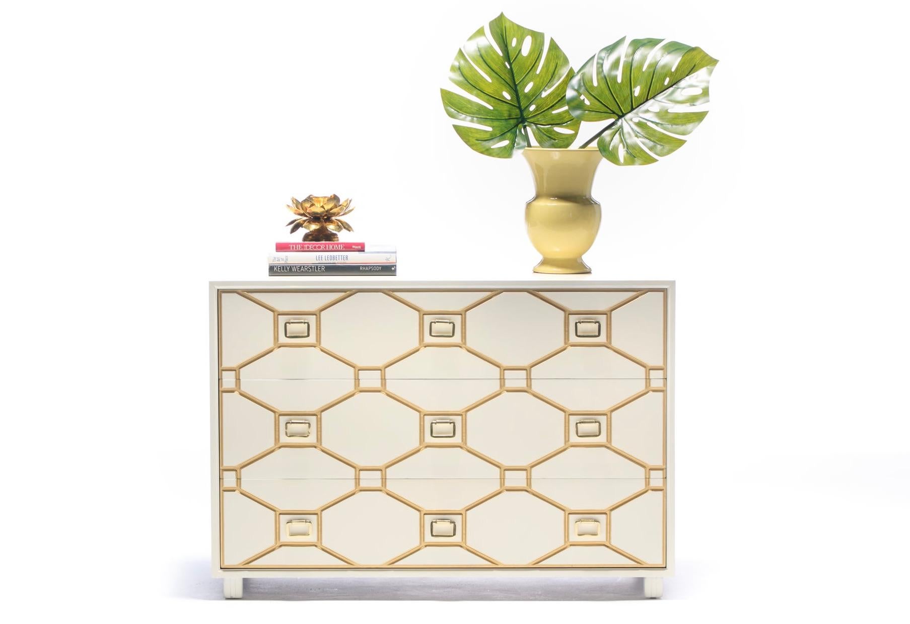 Hollywood glamour then and now, this Viennese Collection chest of drawers was designed by the Queen of Hollywood Regency - Dorothy Draper - in the early 1960s and features solid brass rectangular pulls centered amidst incised rectangles set in an