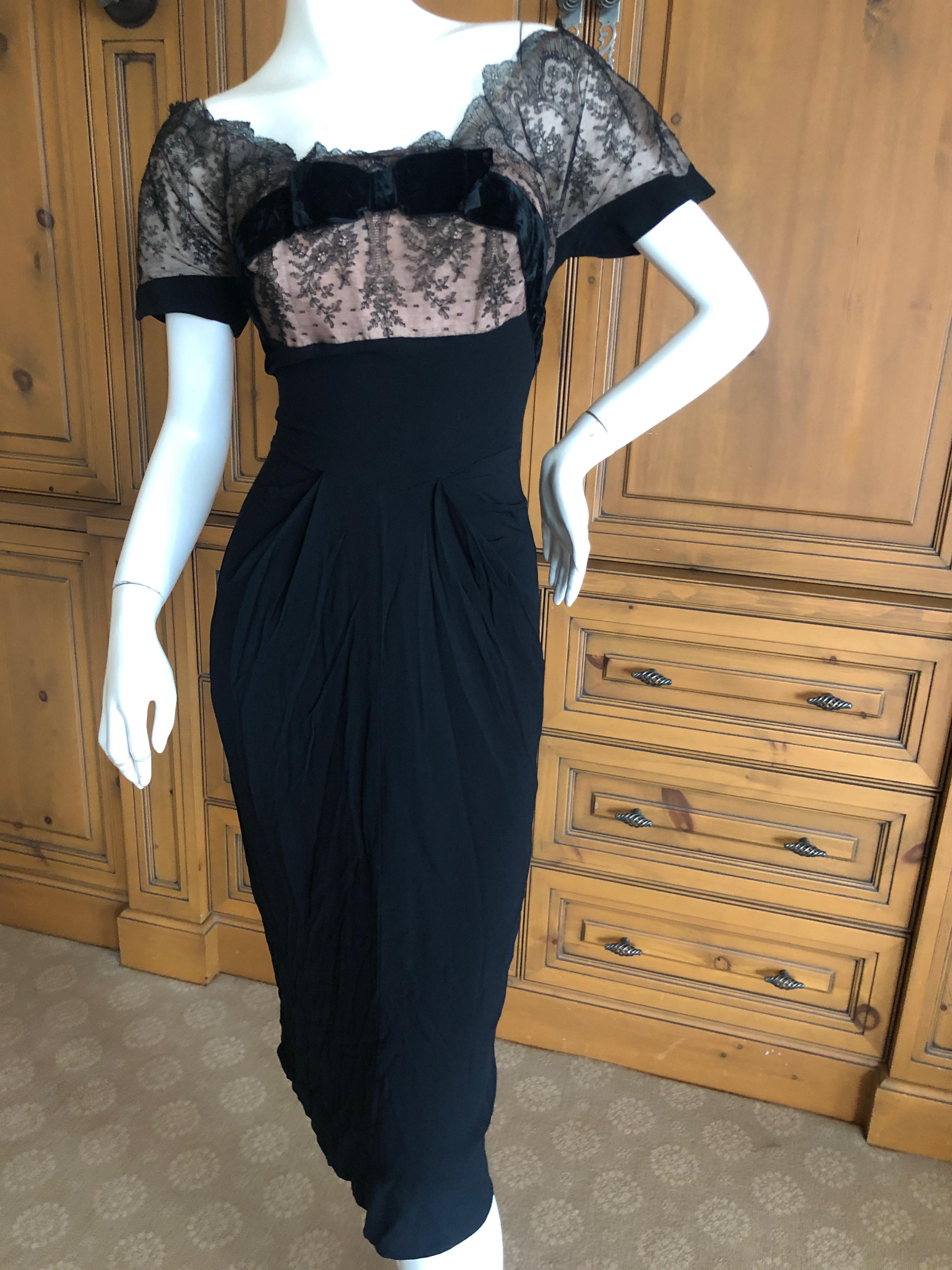 Dorothy O'Hara Hollywood Vintage 1950's Lace Cocktail Dress with Velvet Trim.
O'Hara was a costume designer for Paramount Studios in Hollywood before starting her own dress line in the late 1940's. Known for only designing dresses, no separates and