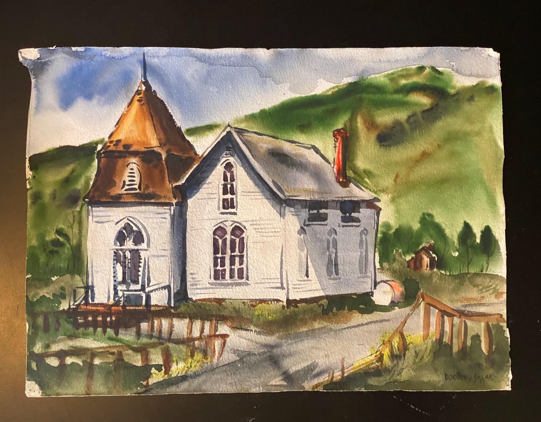 A beautiful and quite engaging original watercolor painting by California artist Dorothy Sklar (1906-1996) featuring a colorful, lush landscape with mountain backdrop contrasted against a white painted church.   

The painting is signed and dated