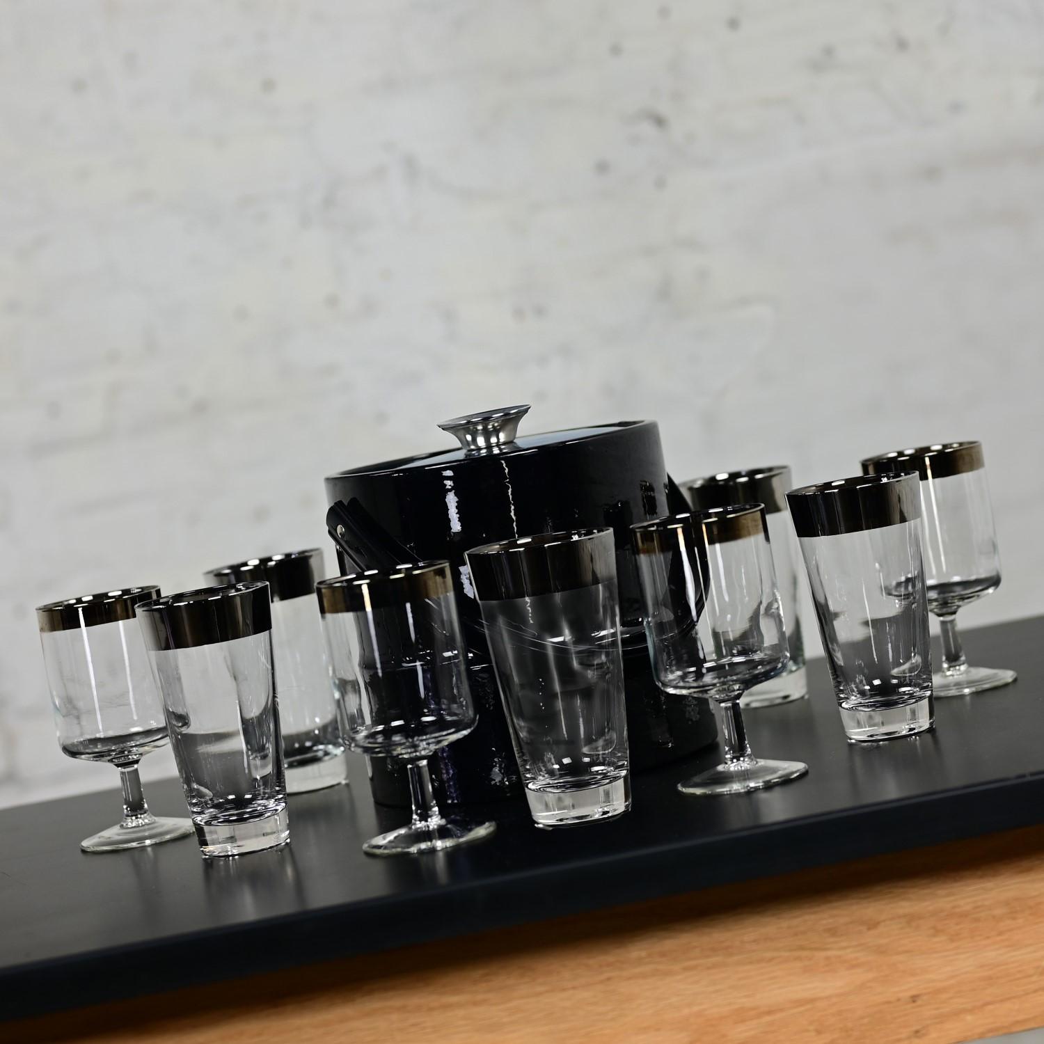 Marvelous Mid-20th Century MCM or Mid Century Modern Dorothy Thorpe Allegro collection style silver banded set of 5 tumblers, 4 stems, and one black faux patent leather Kraftware signed ice bucket with yellow & white marbleized interior bucket,