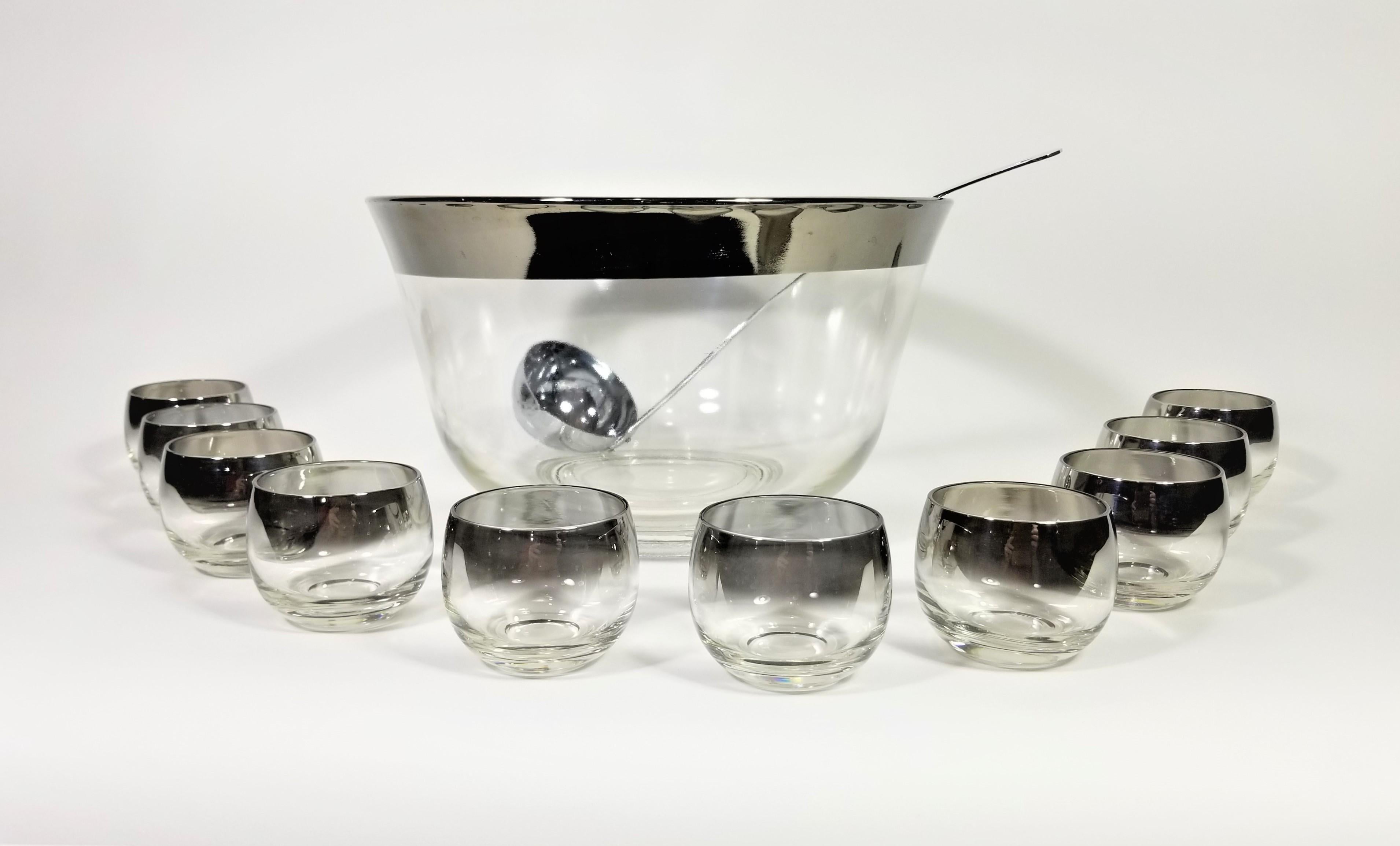 Mid Century 1960s Dorothy Thorpe Glassware Barware. Punch Bowl Set. 12 piece includes 1 large bowl with ladle and 10 glasses. Glasses are often referred to as roly poly glasses due to their round modern shape.

Punch Bowl Height: 6.5 inches
Punch