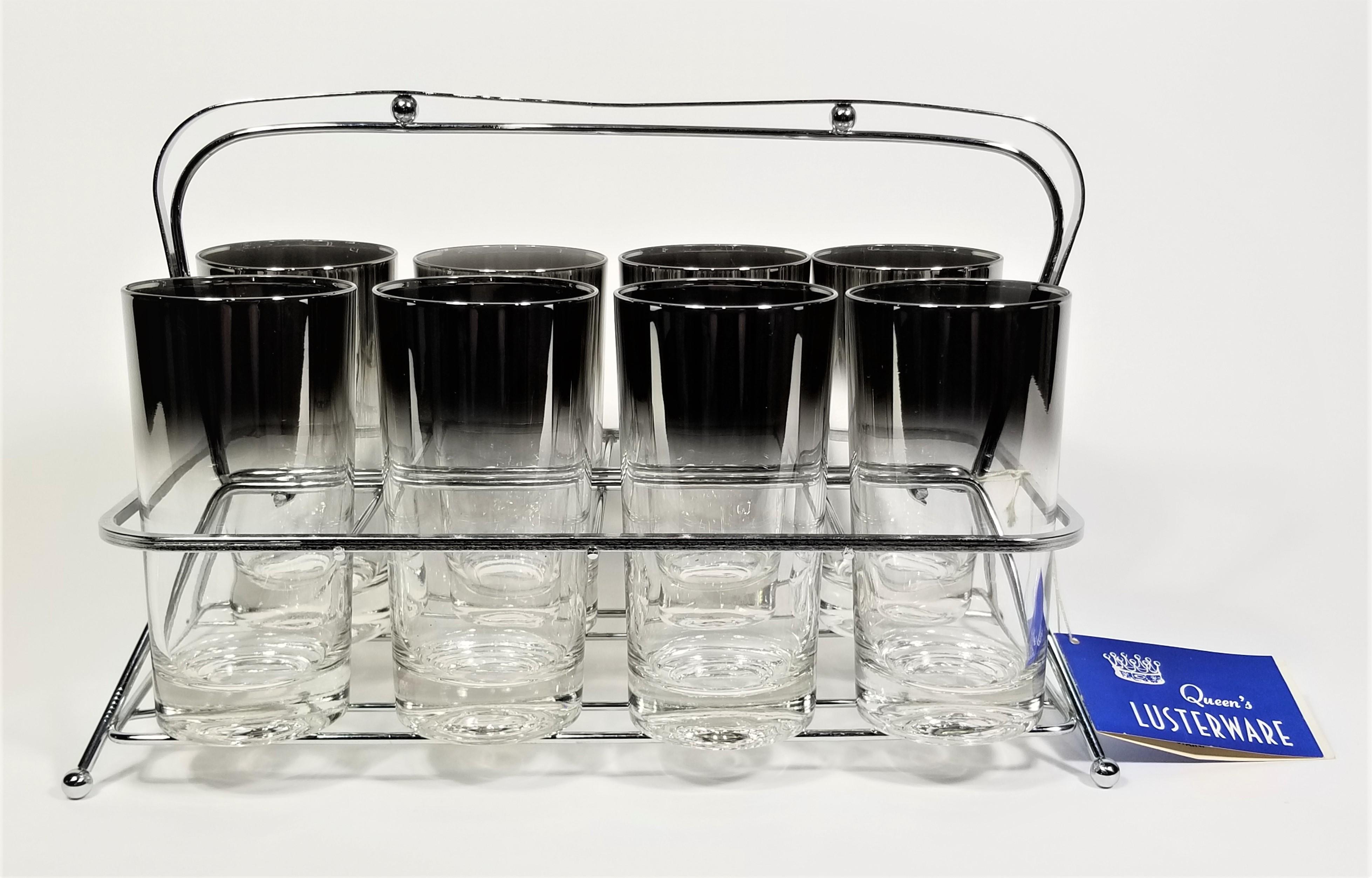  Mid Century Dorothy Thorpe style glassware barware. Set of 8. Excellent condition. Unused still retains original tag. 

Measurements:
Rack height: 8.75 inches
Rack width: 13.5 inches
Rack depth: 6.75 inches

Glass height: 5.63 inches
Glass