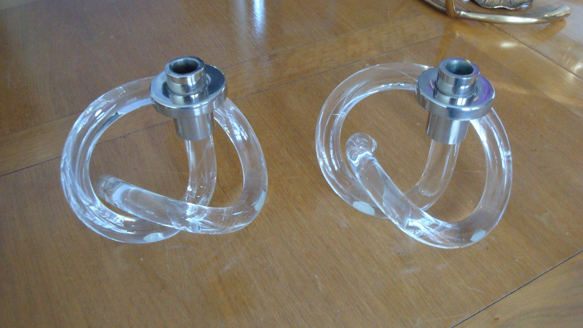 This is a pair of Dorothy Thorpe pretzyl candlesticks from the 1950s.
