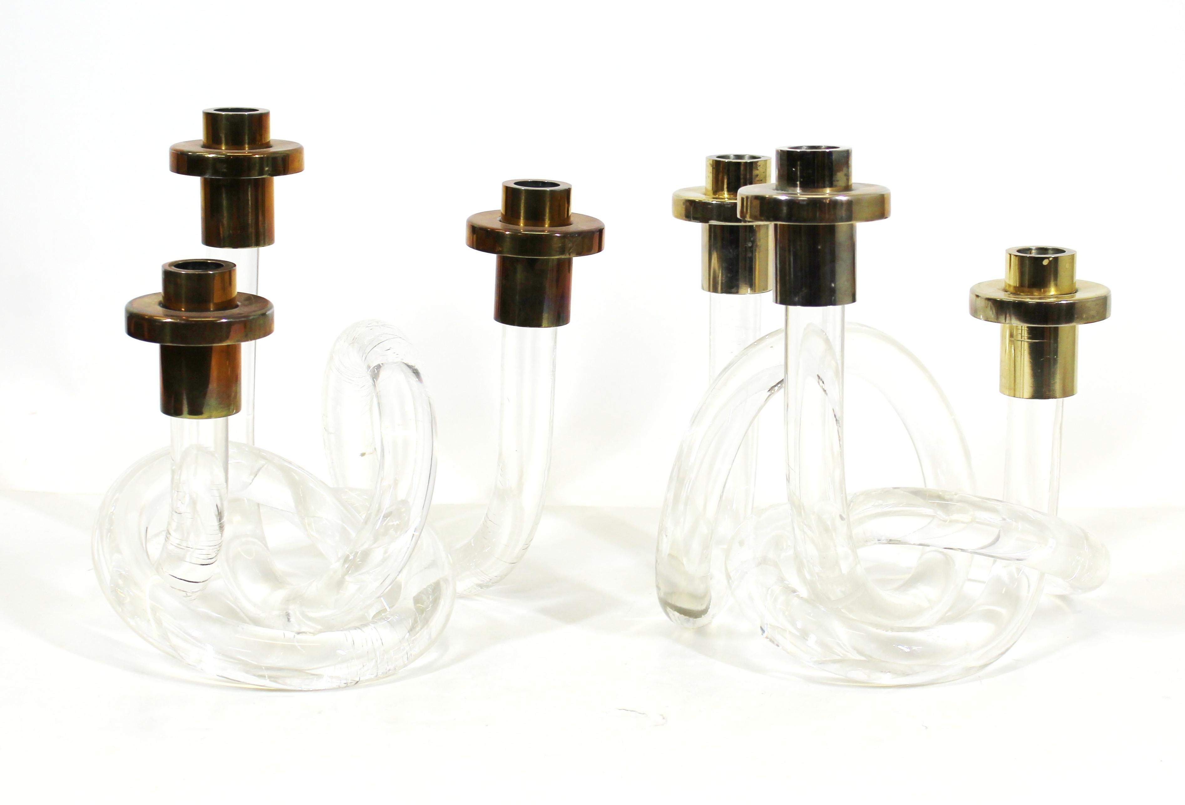 Dorothy Thorpe Mid-Century Modern pair of lucite pretzel candleholders, each one fitting three candles.